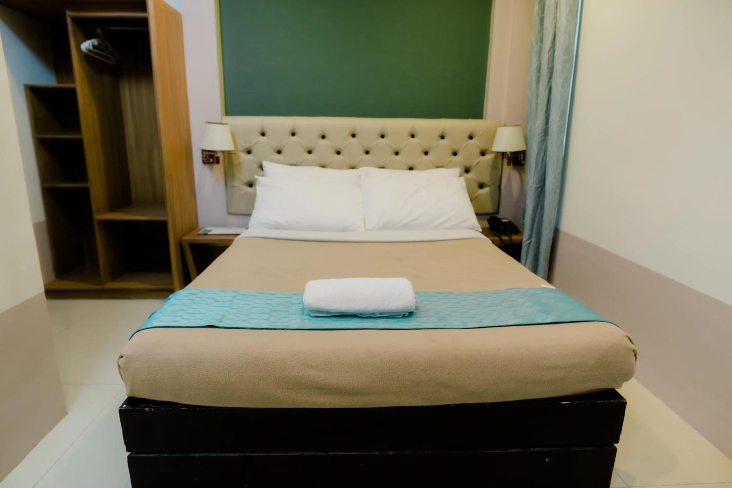 Bed in The Horizon Suites and Arcade