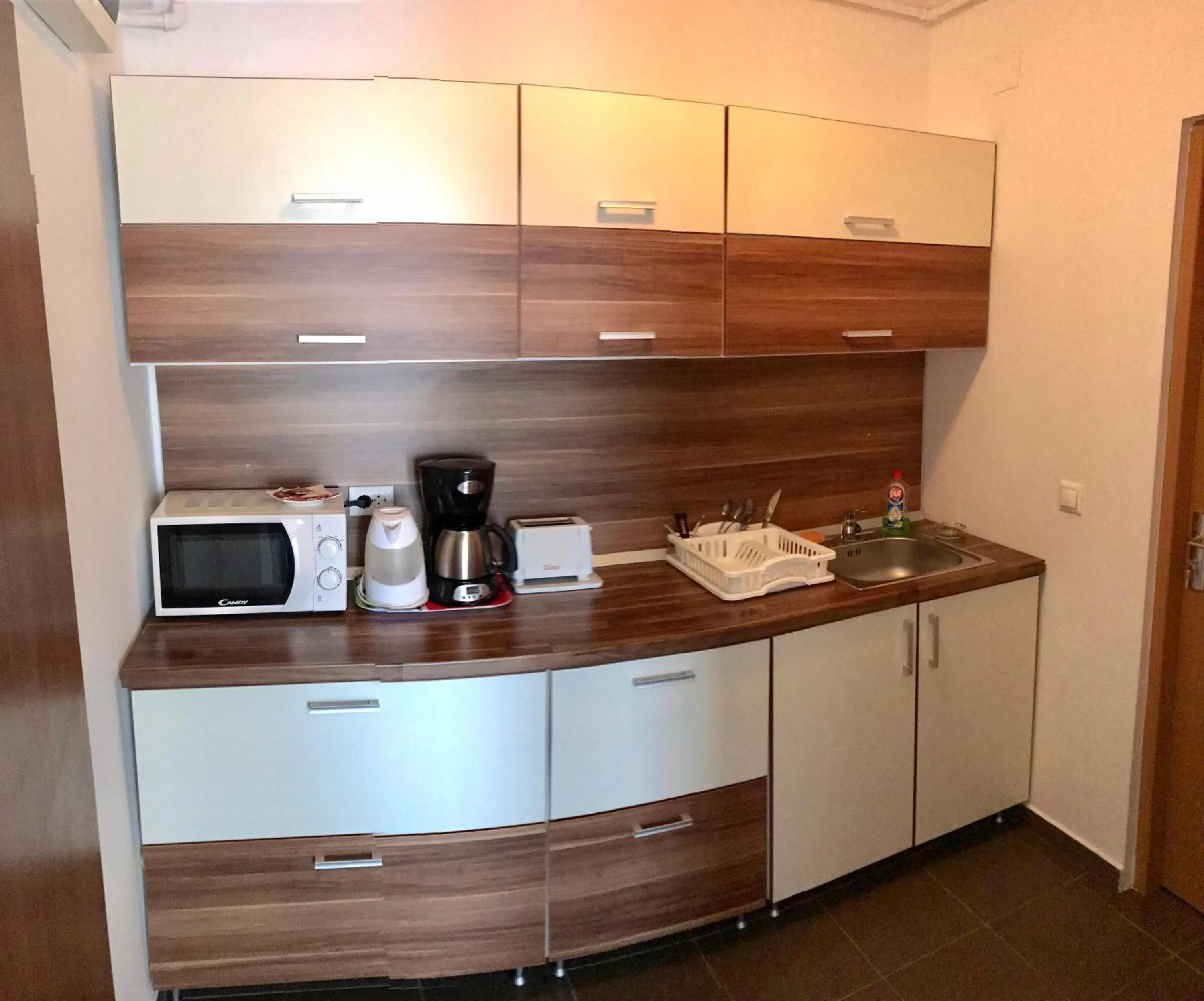 Kitchen or kitchenette in ApartHotel Zorilor