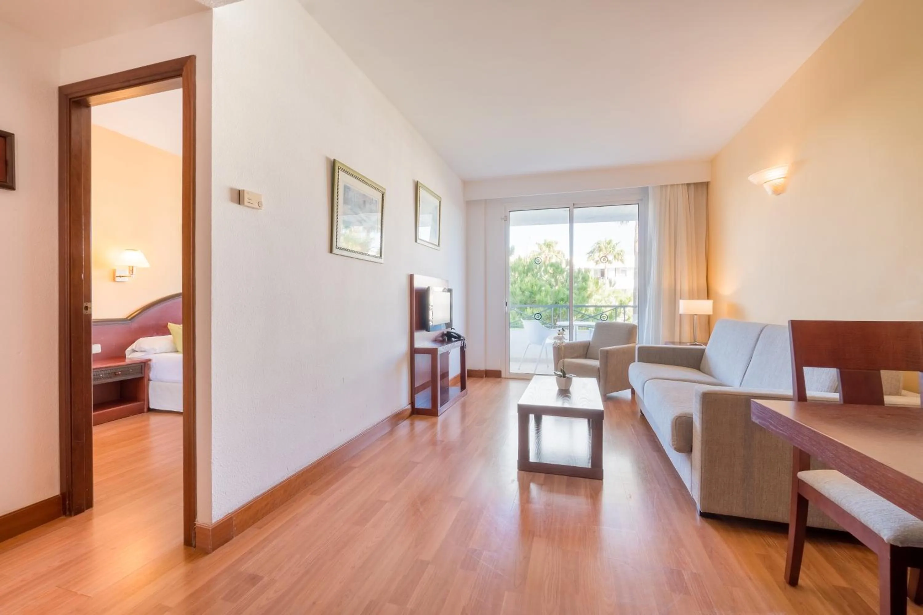 Living room, Bed in Tropicana Hotel