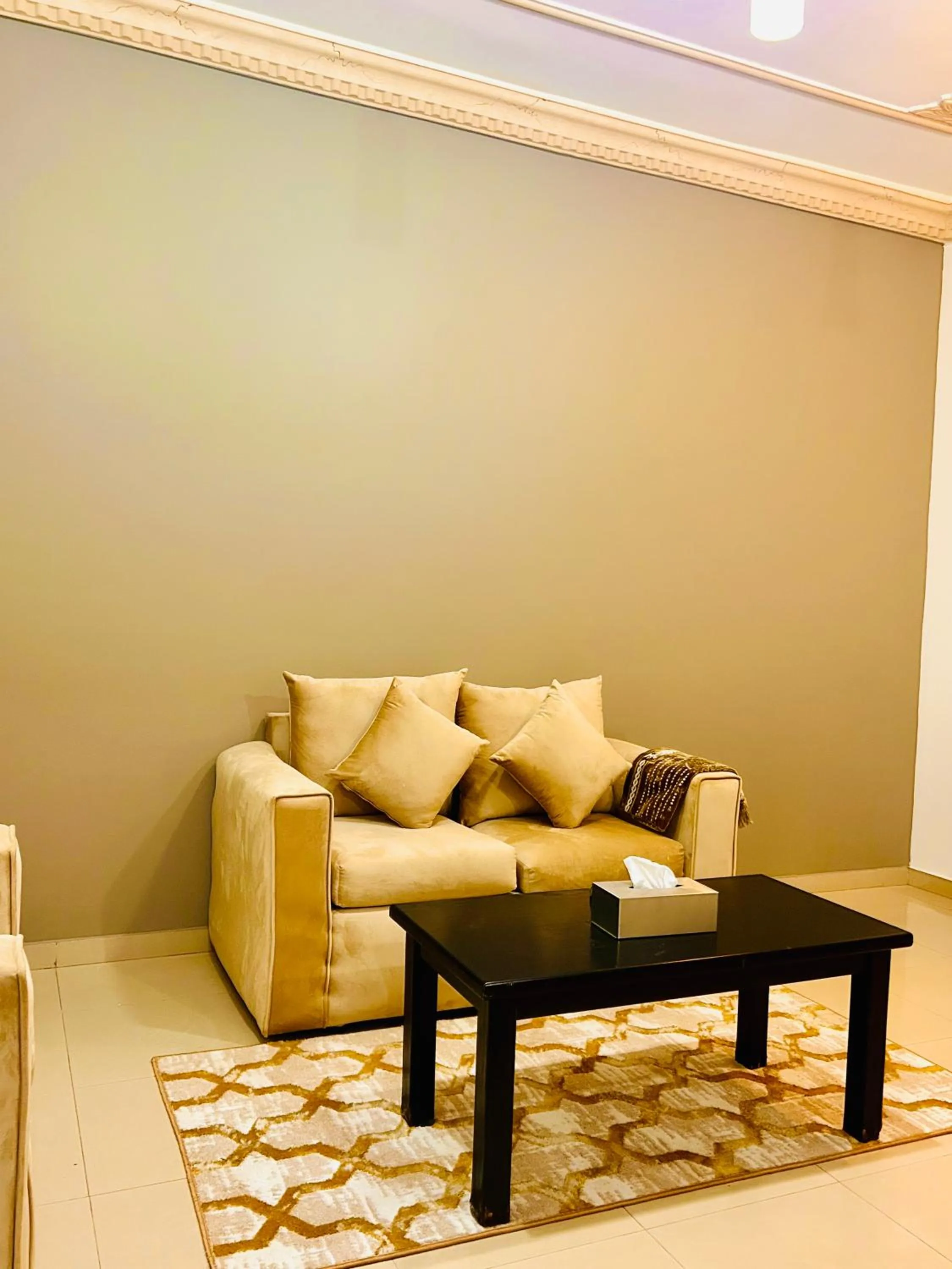 Living room in Arabian Palm Hotel