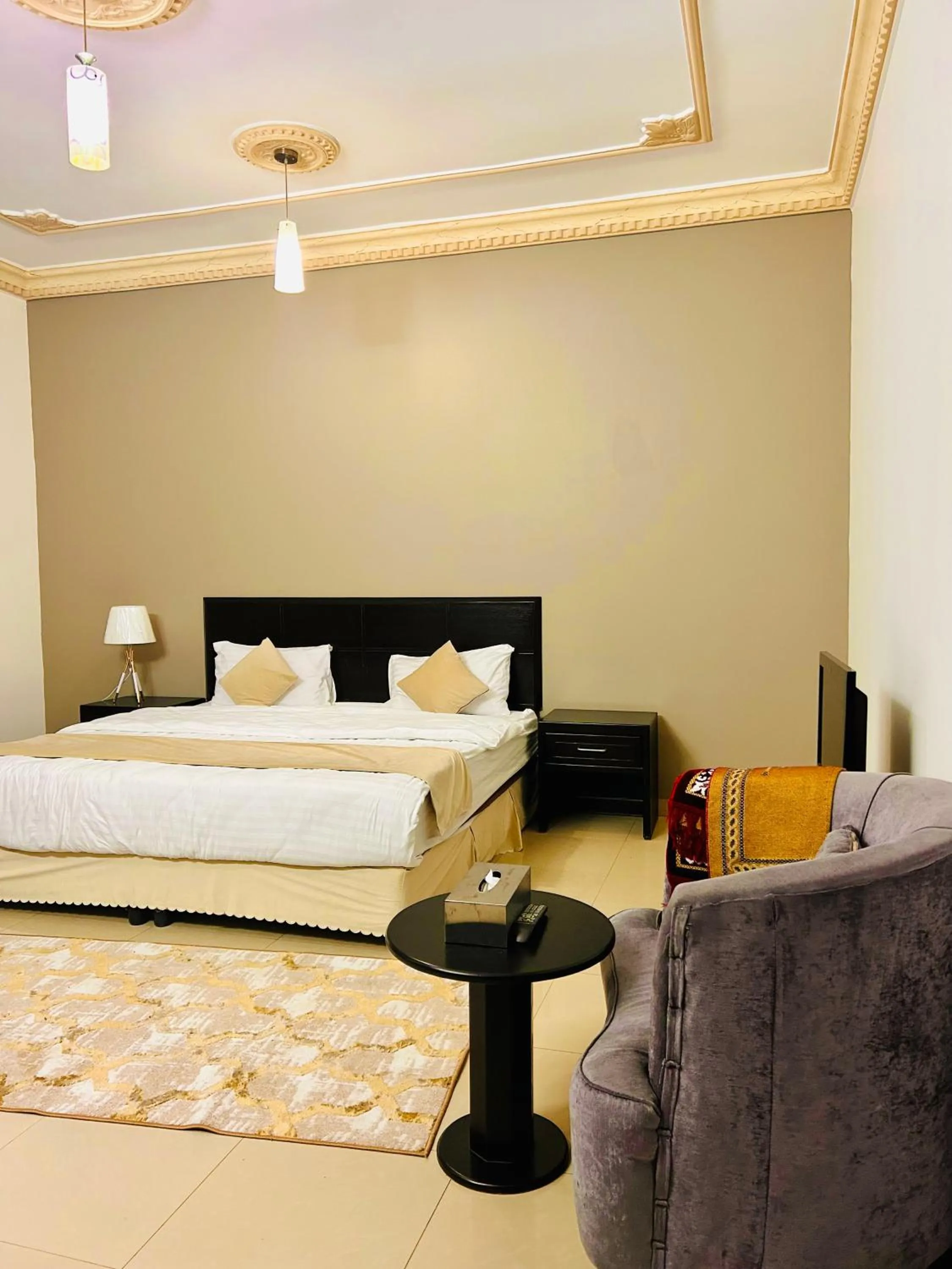 Bed in Arabian Palm Hotel