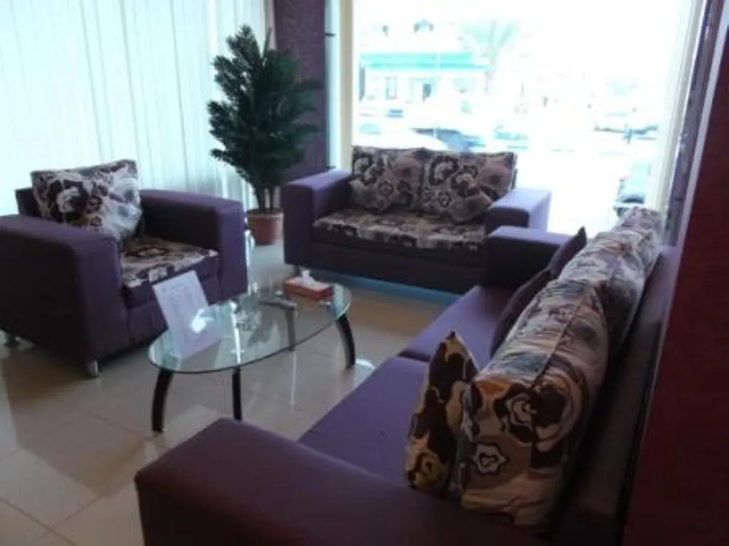 Living room in Arabian Palm Hotel