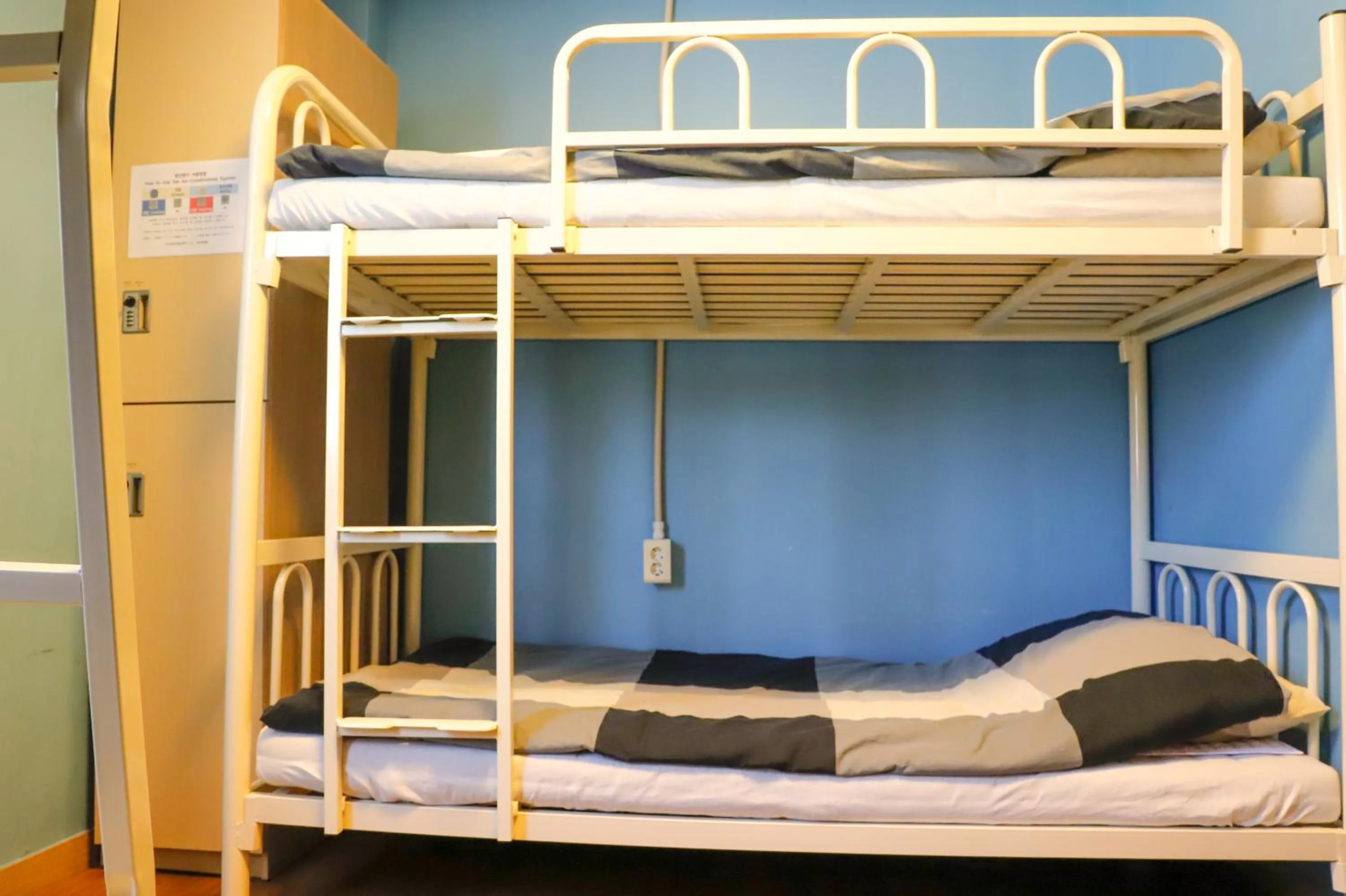 Bedroom, Bed in Busan Sukbak Dot Com Guesthouse