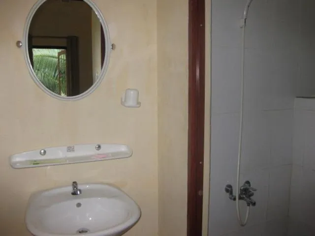 Bathroom in Cocosand Hotel
