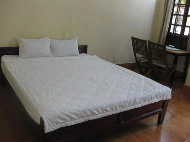 Bed in Cocosand Hotel