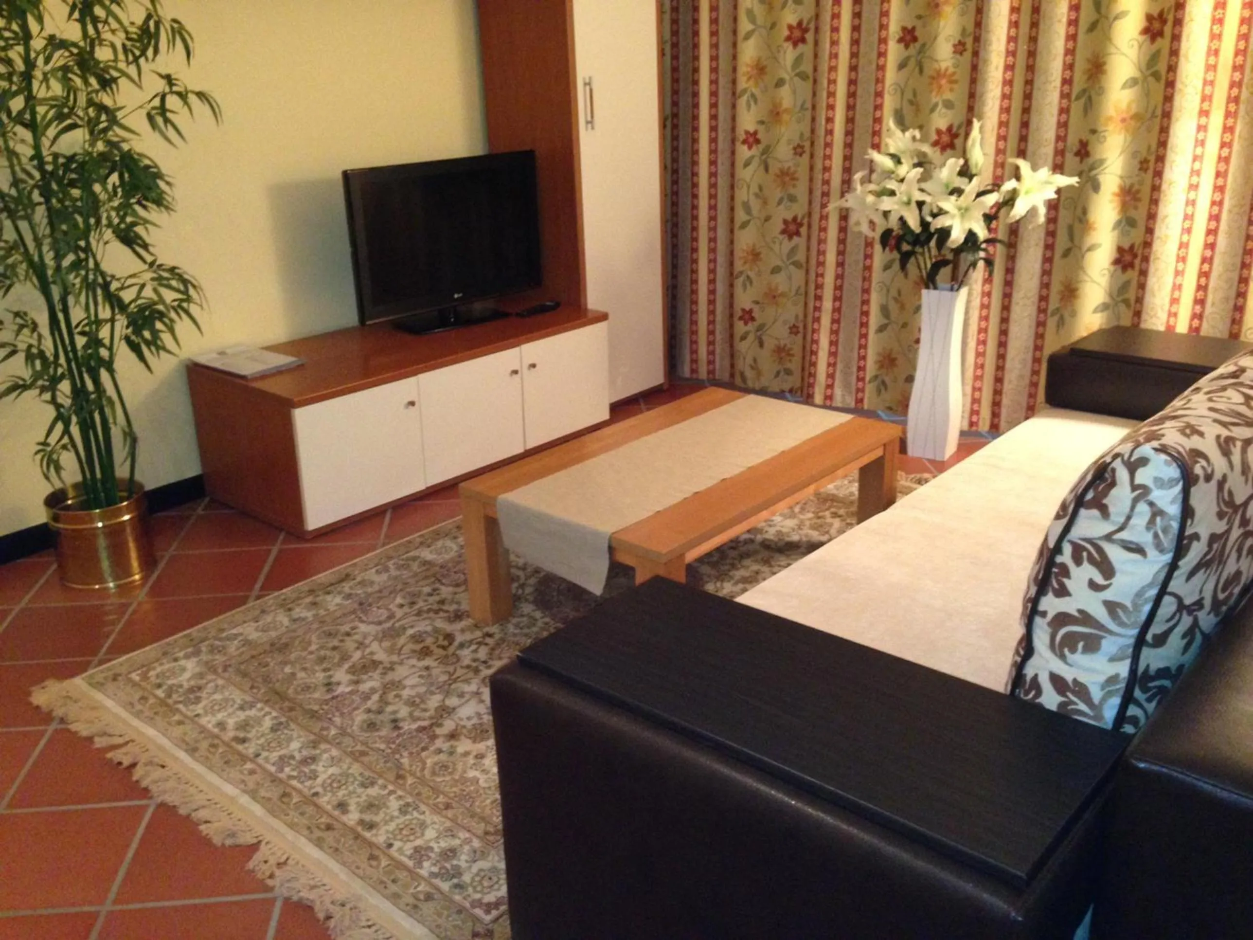 Living room, Bed in Aksai Residence