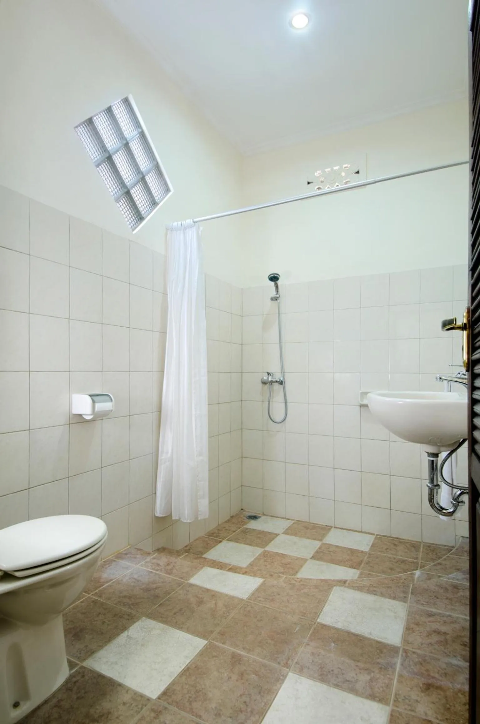 Bathroom in Teja Home Stay