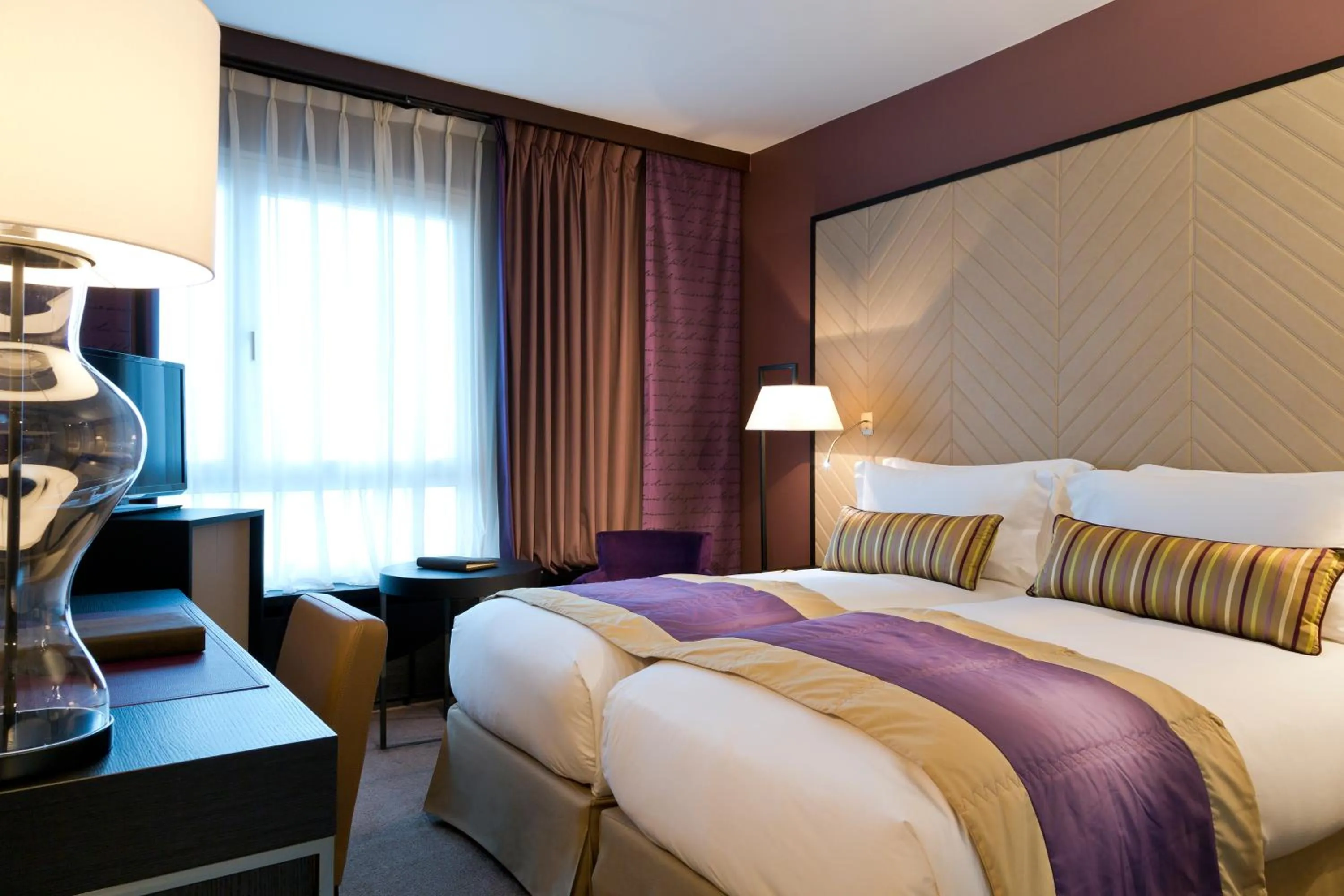 Photo of the whole room, Bed in Sofitel Strasbourg Grande Ile