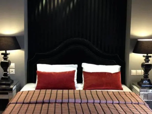 Bed in Nerida Boutique Hotel
