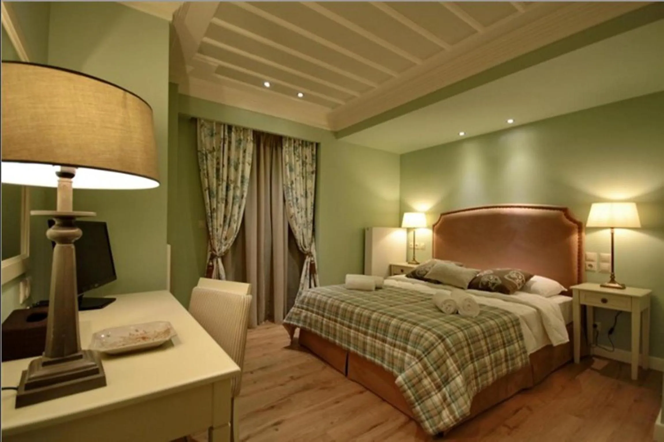 Bed in Nerida Boutique Hotel