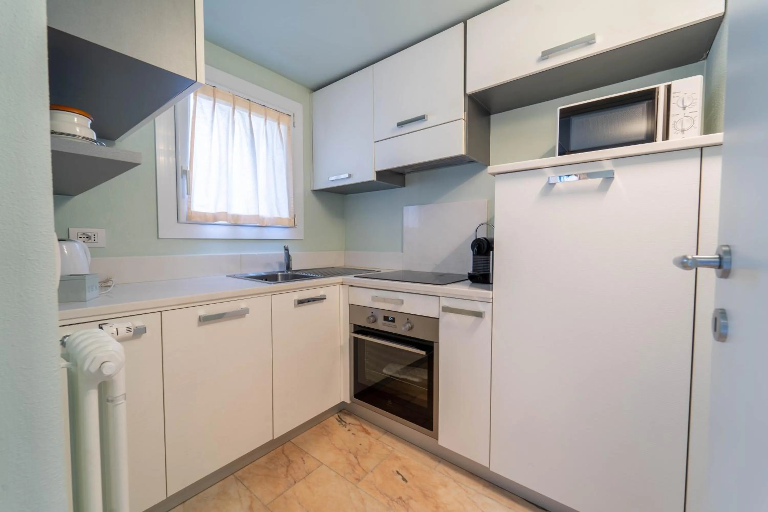 Kitchen or kitchenette in B&B Nonna Costantina