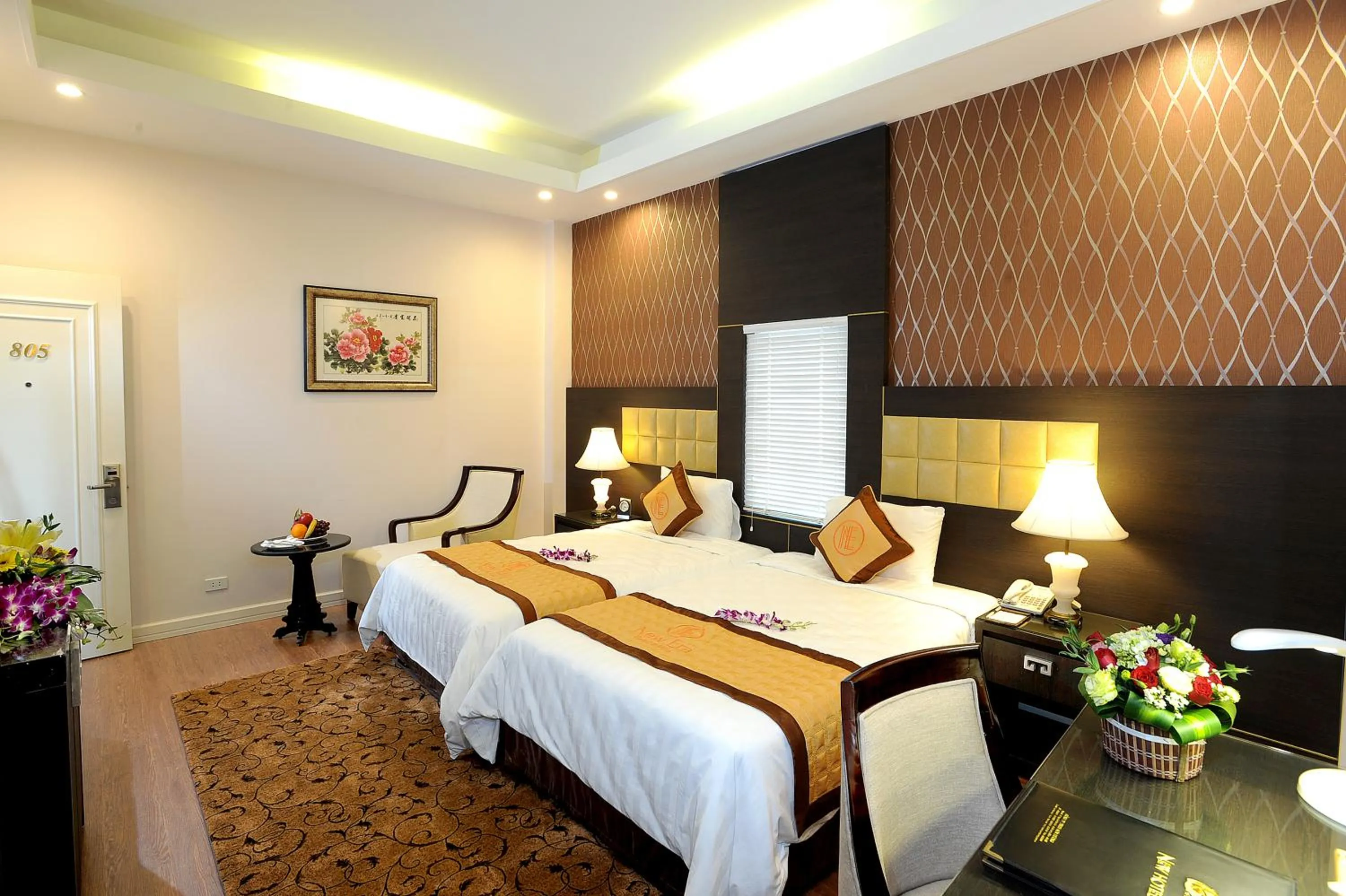 Bedroom in New Era Hotel & Villa