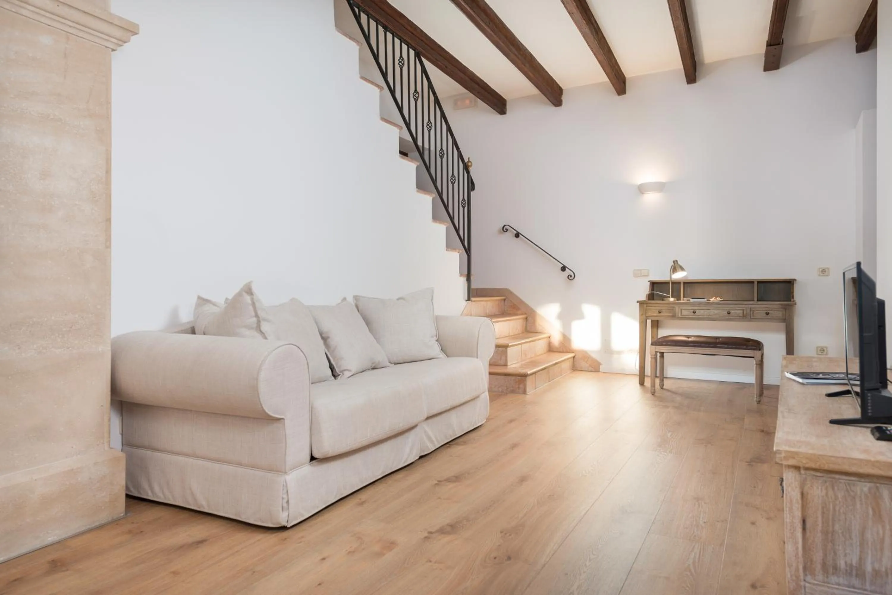 Seating area in New Can Furios Hotel by Can Calco Hotels