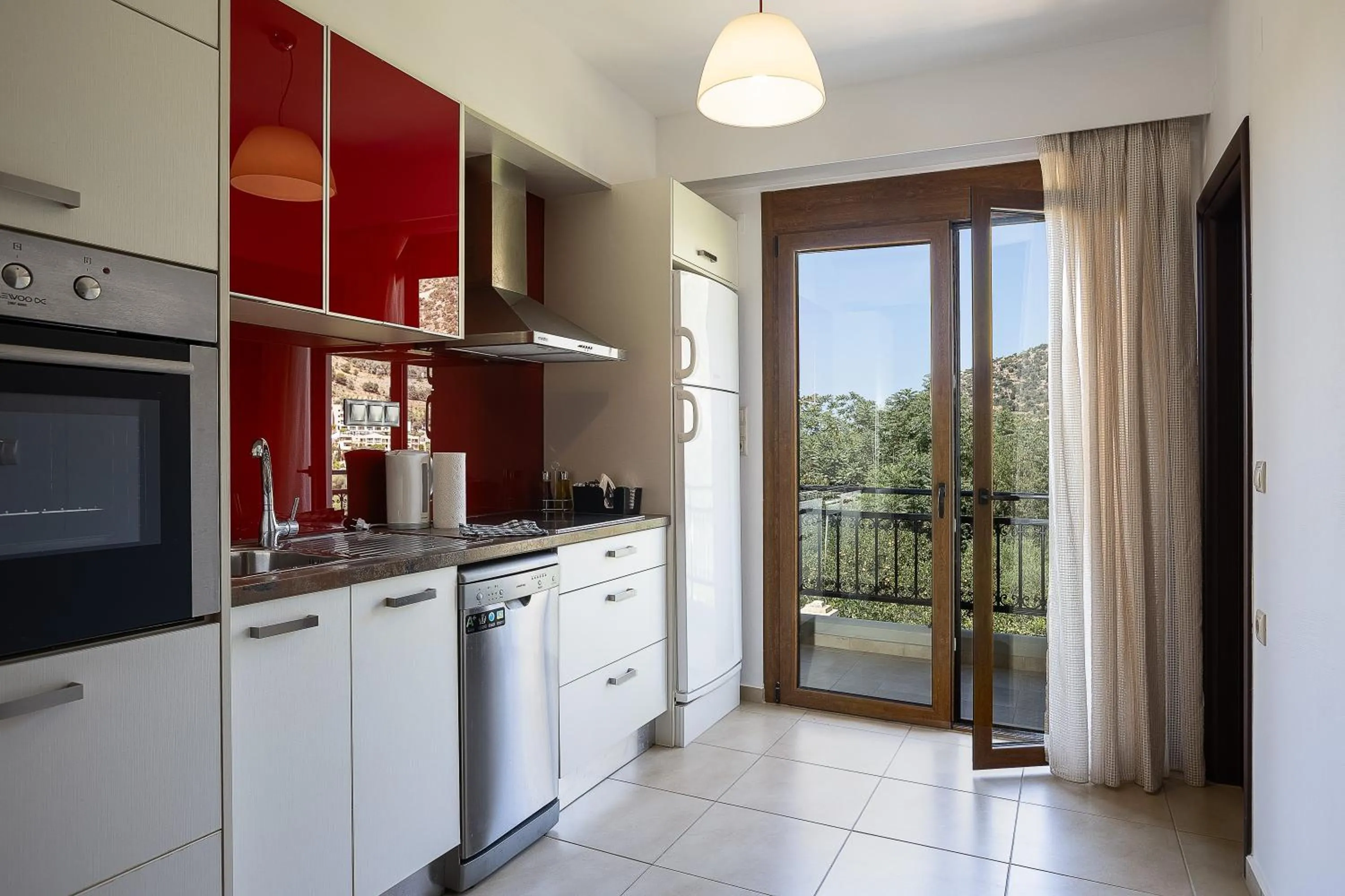 Kitchen or kitchenette in Pantheon Villas & Suites