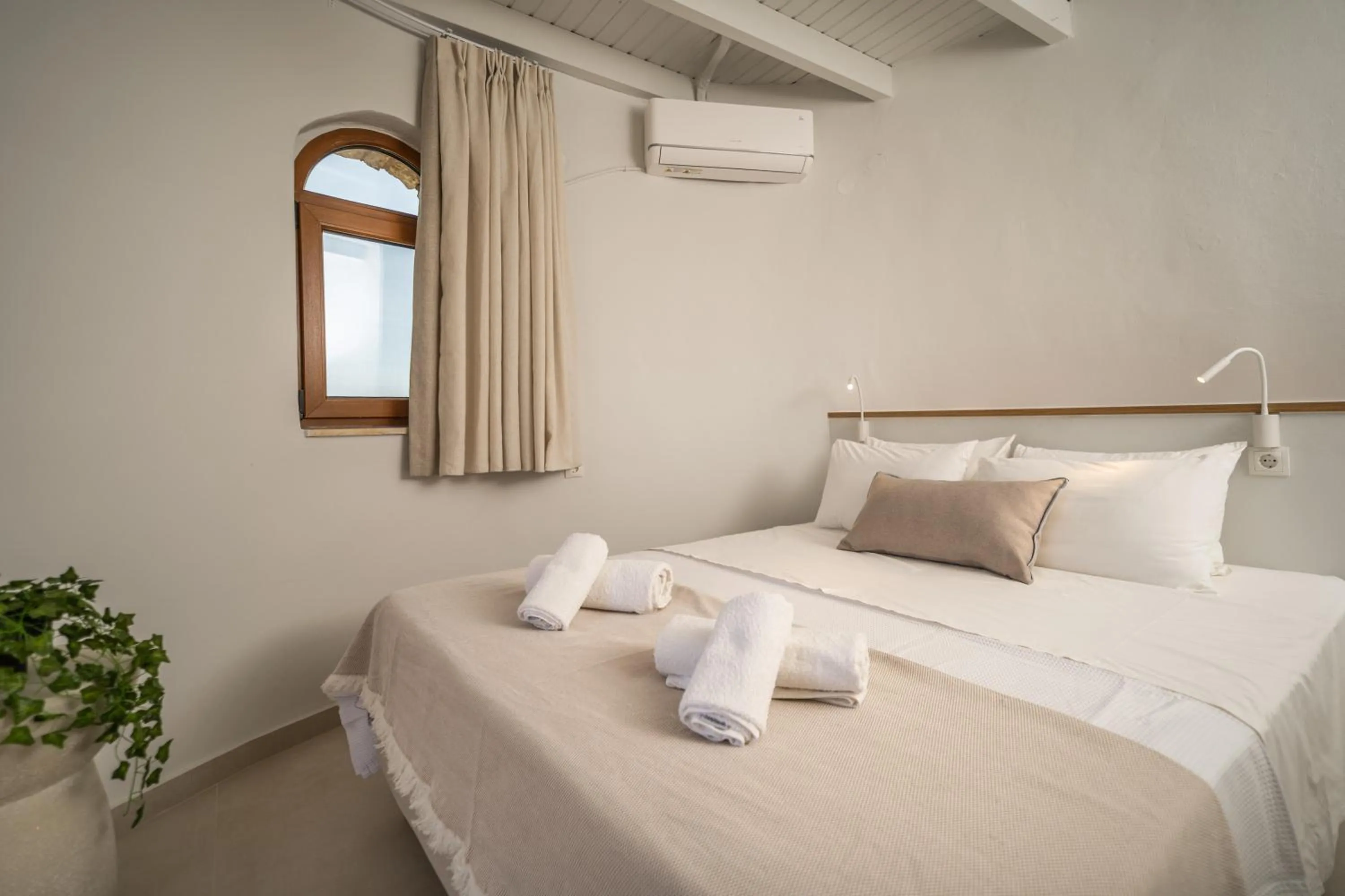 Bed in Fata Morgana Studios & Apartments