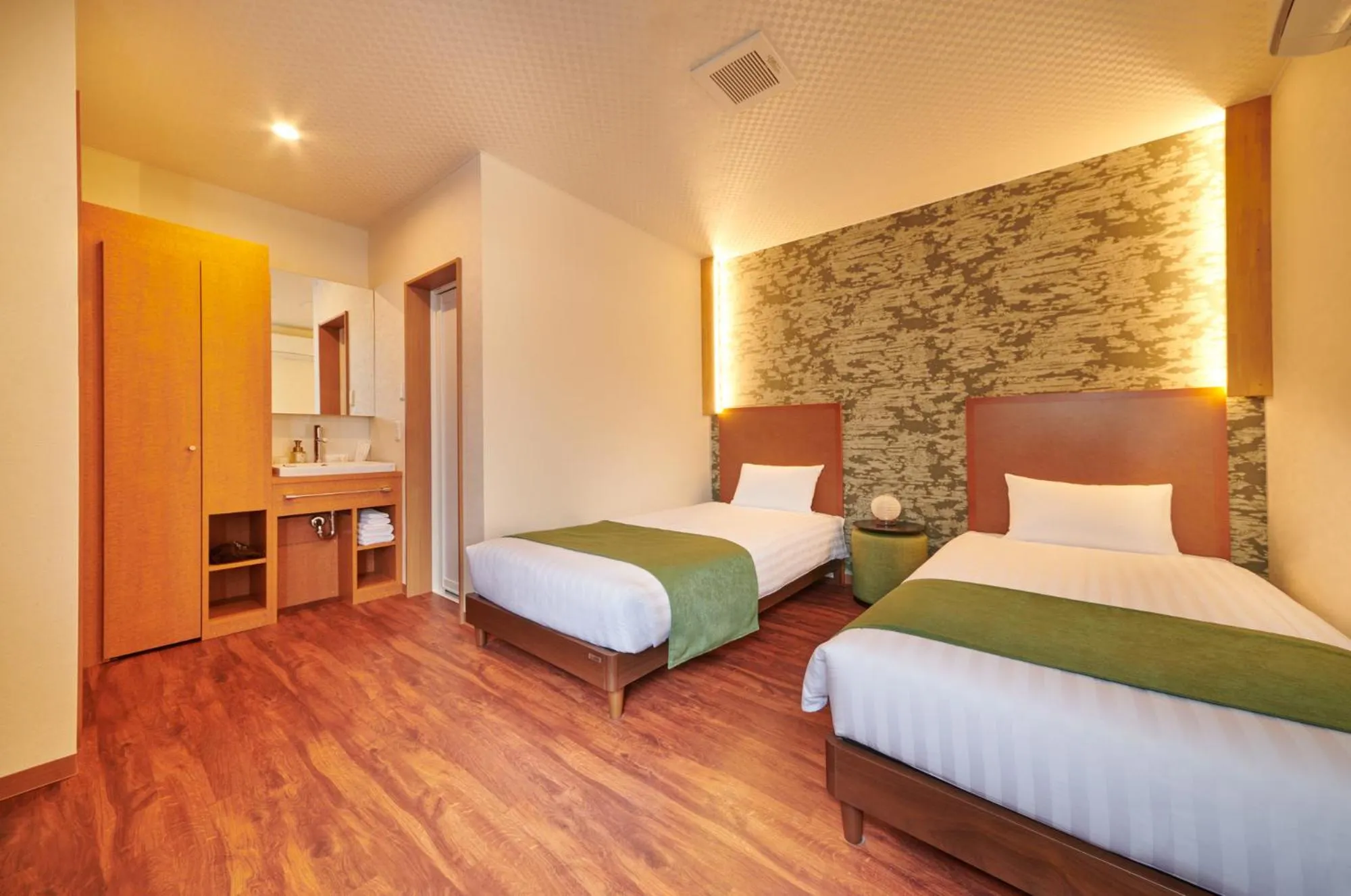 Bed in Ichinomatsu Japanese Modern Hotel