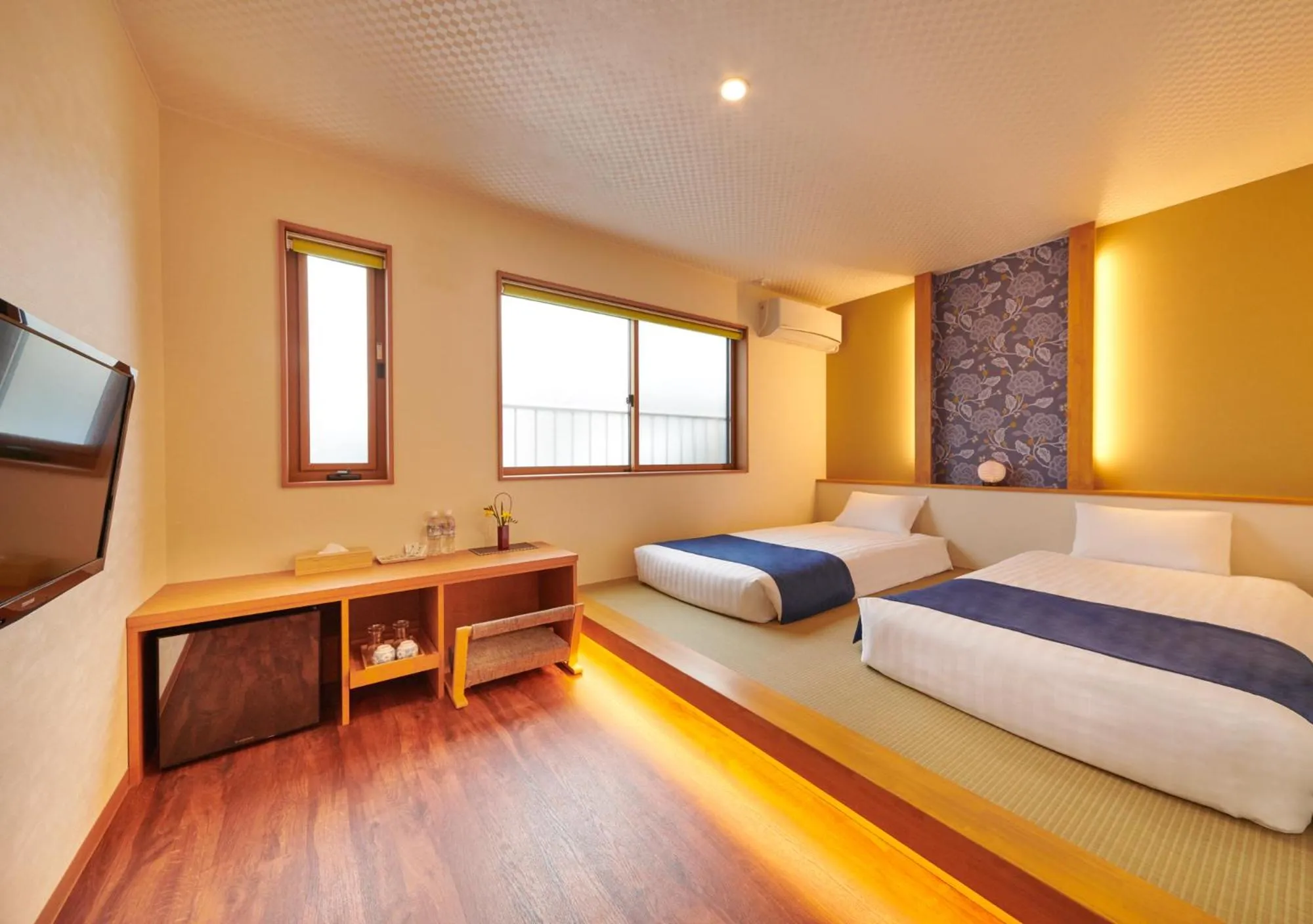 Bed in Ichinomatsu Japanese Modern Hotel