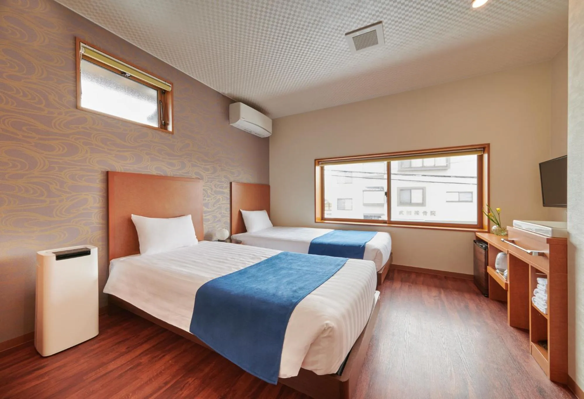 Bed in Ichinomatsu Japanese Modern Hotel