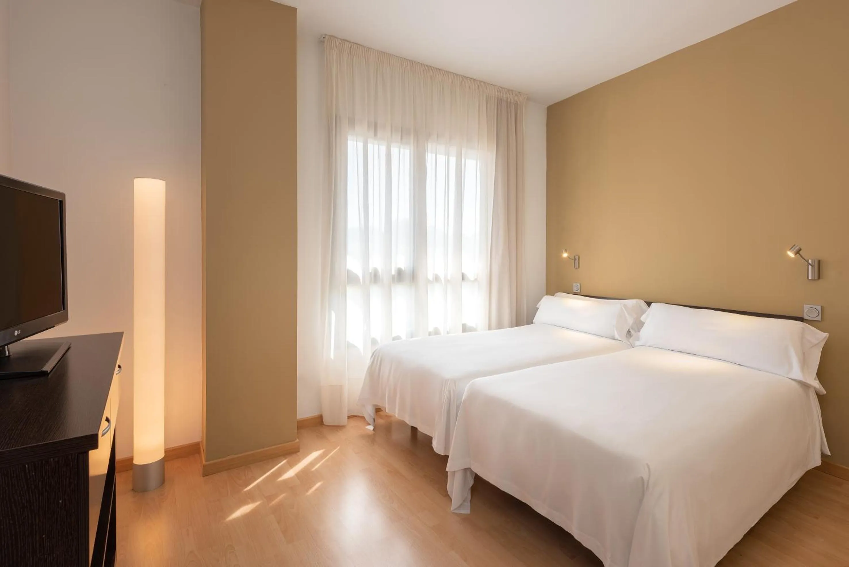 Bed in Madrid Airport Suites, Affiliated by Meliá