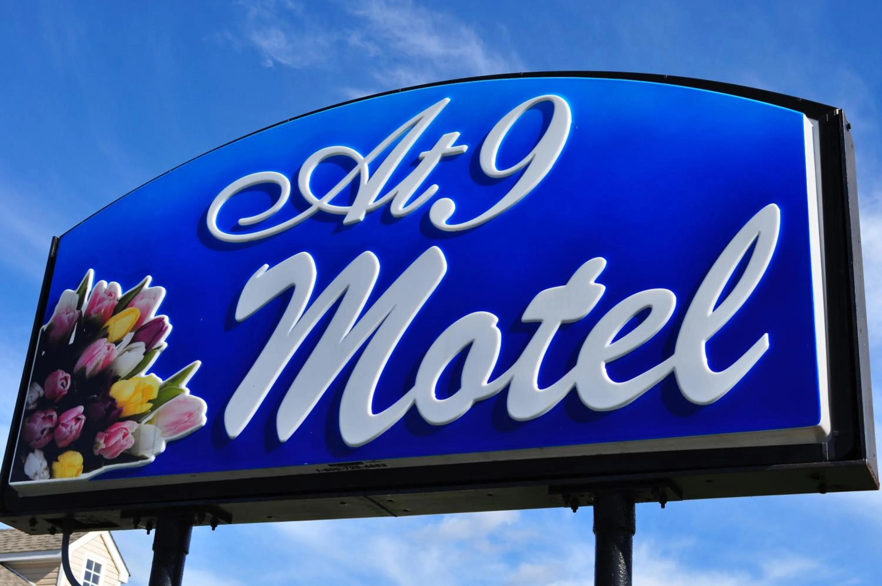 Property logo or sign in At 9 Motel