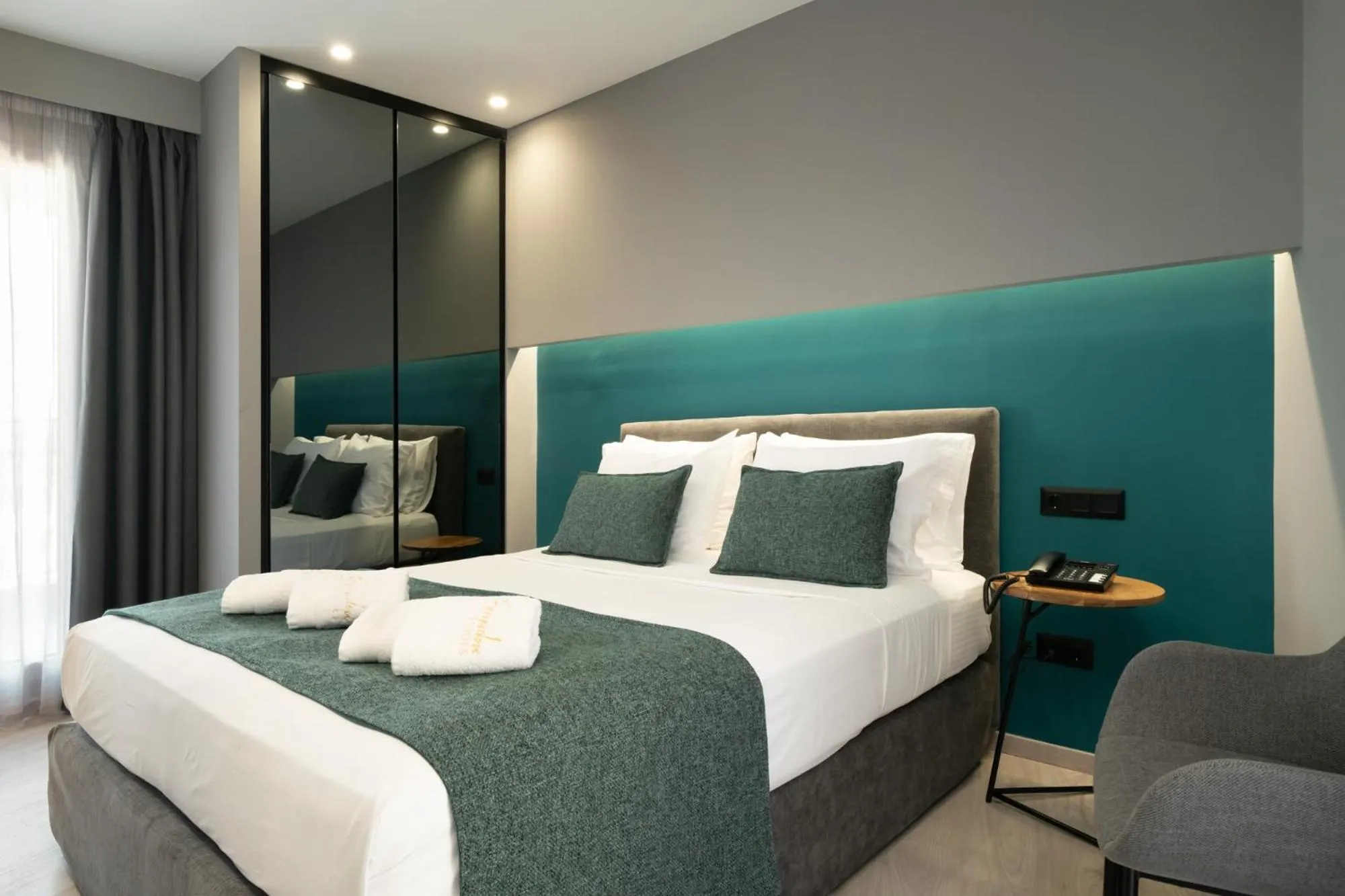 Bed in Evripidou Suites