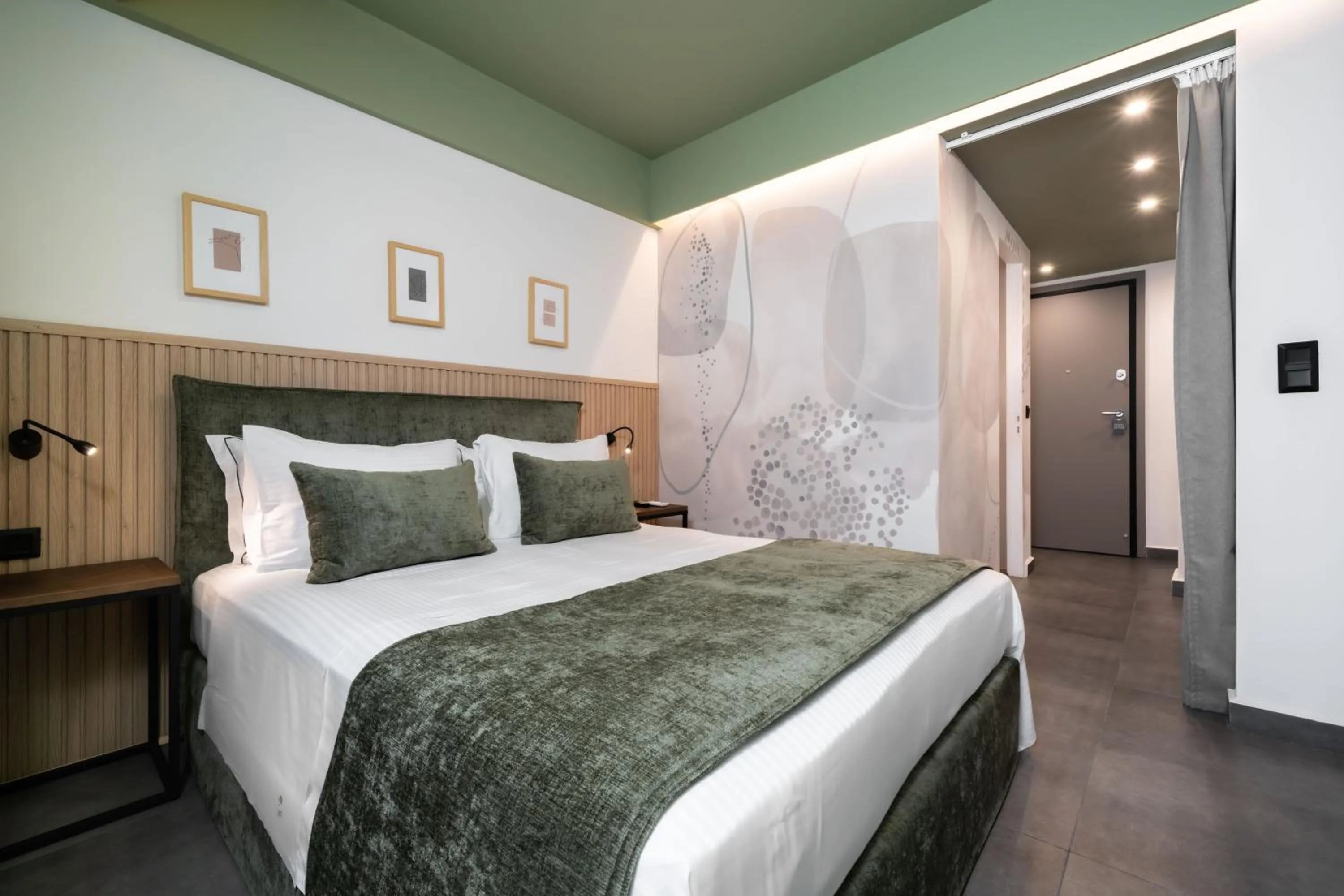 Bed in Evripidou Suites