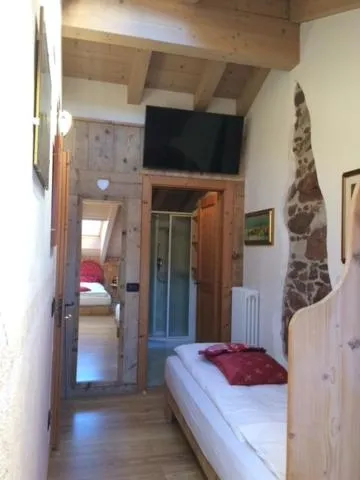 Bed in Hotel Garnì Salvanel