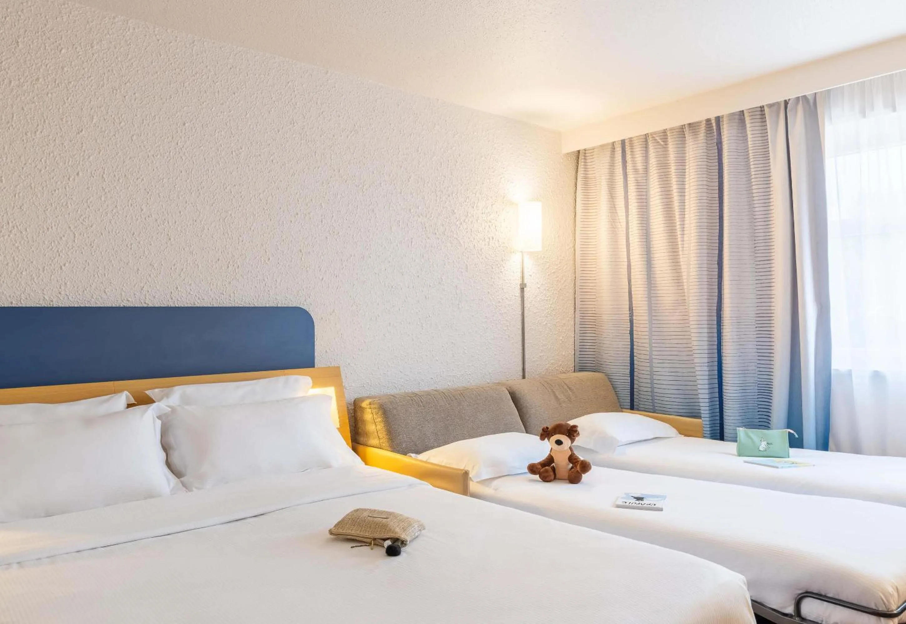 Photo of the whole room, Bed in B&B HOTEL Lyon Nord 4 étoiles