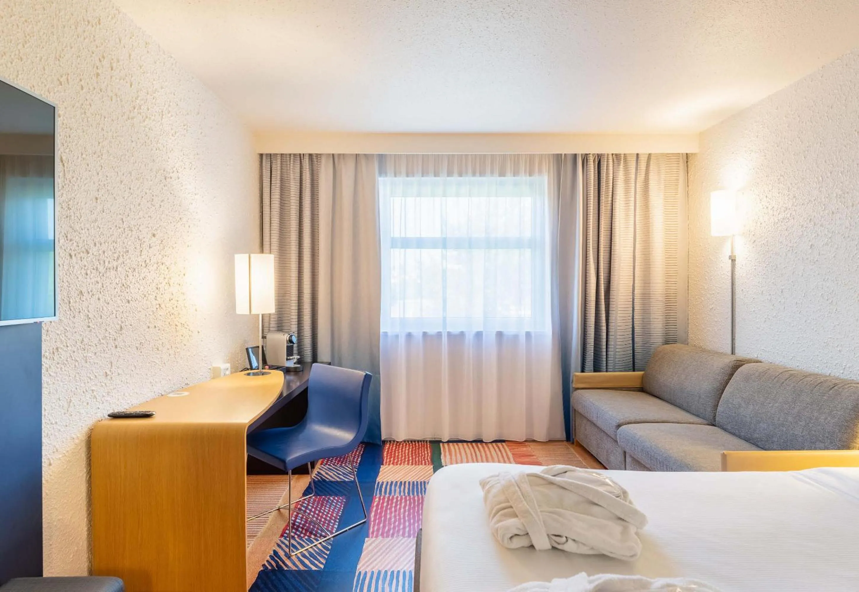 Photo of the whole room, Bed in B&B HOTEL Lyon Nord 4 étoiles