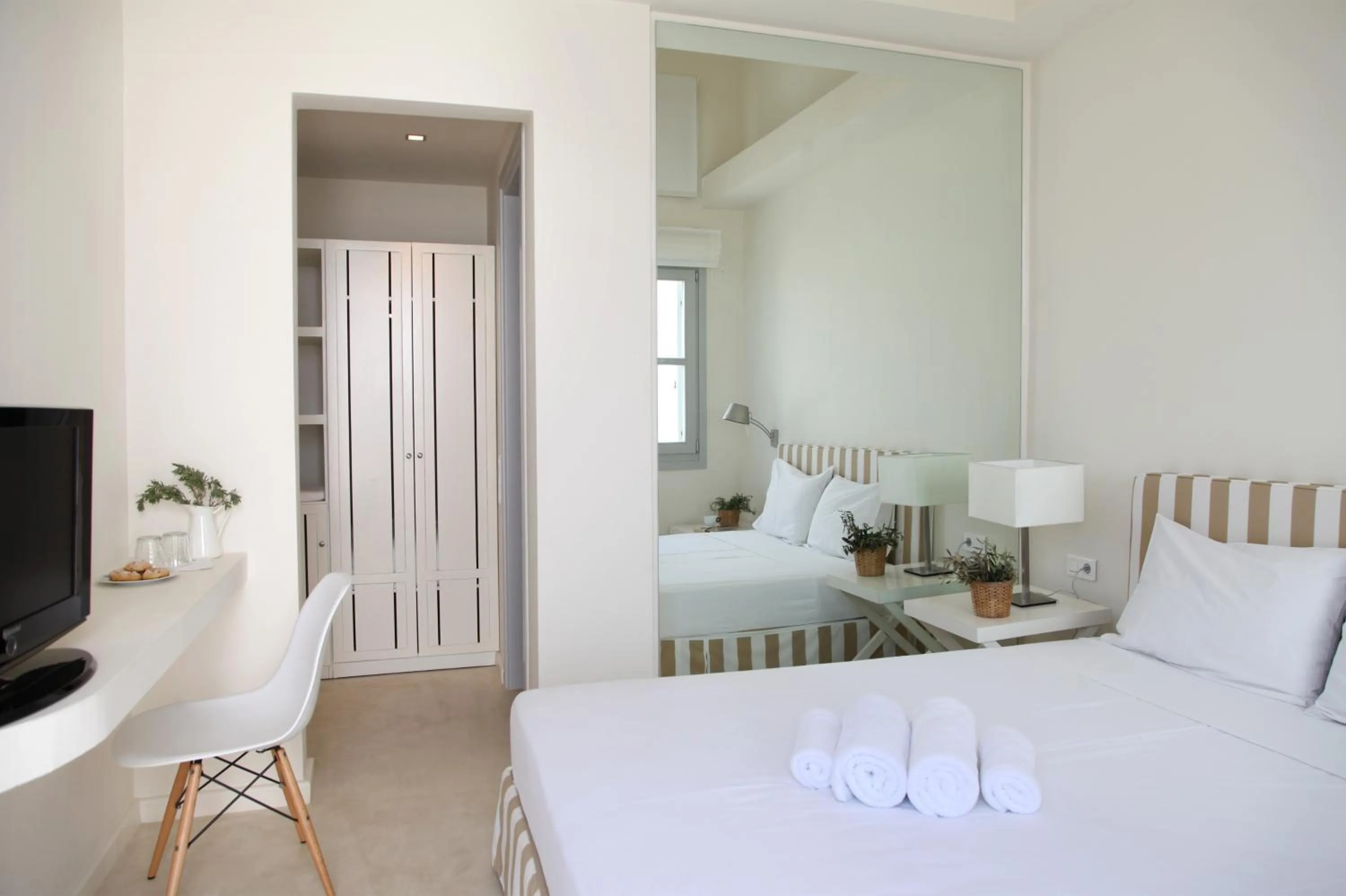 Bed in Skyros Ammos Hotel