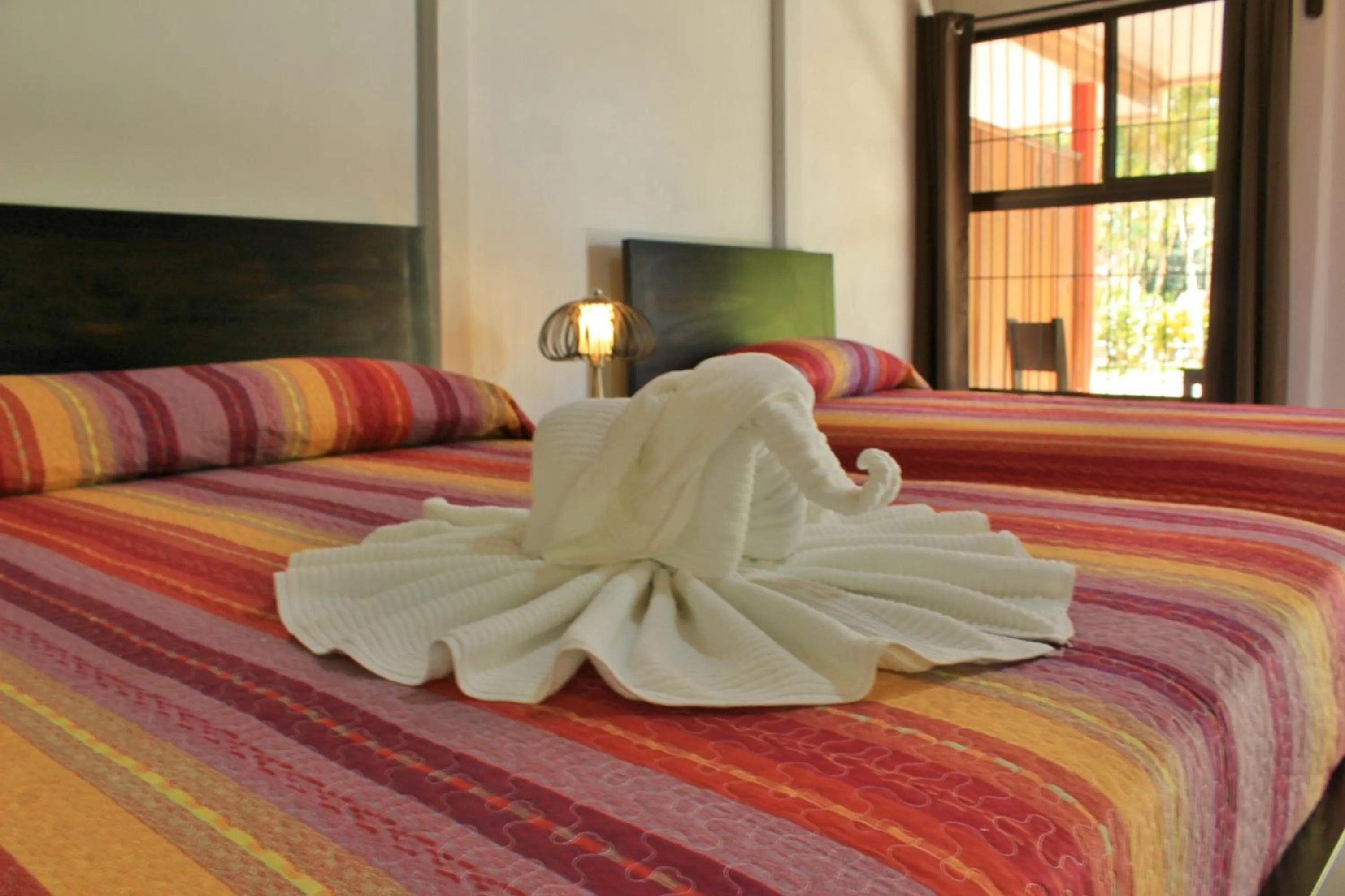 Bed in Hotel Arenal Country Inn