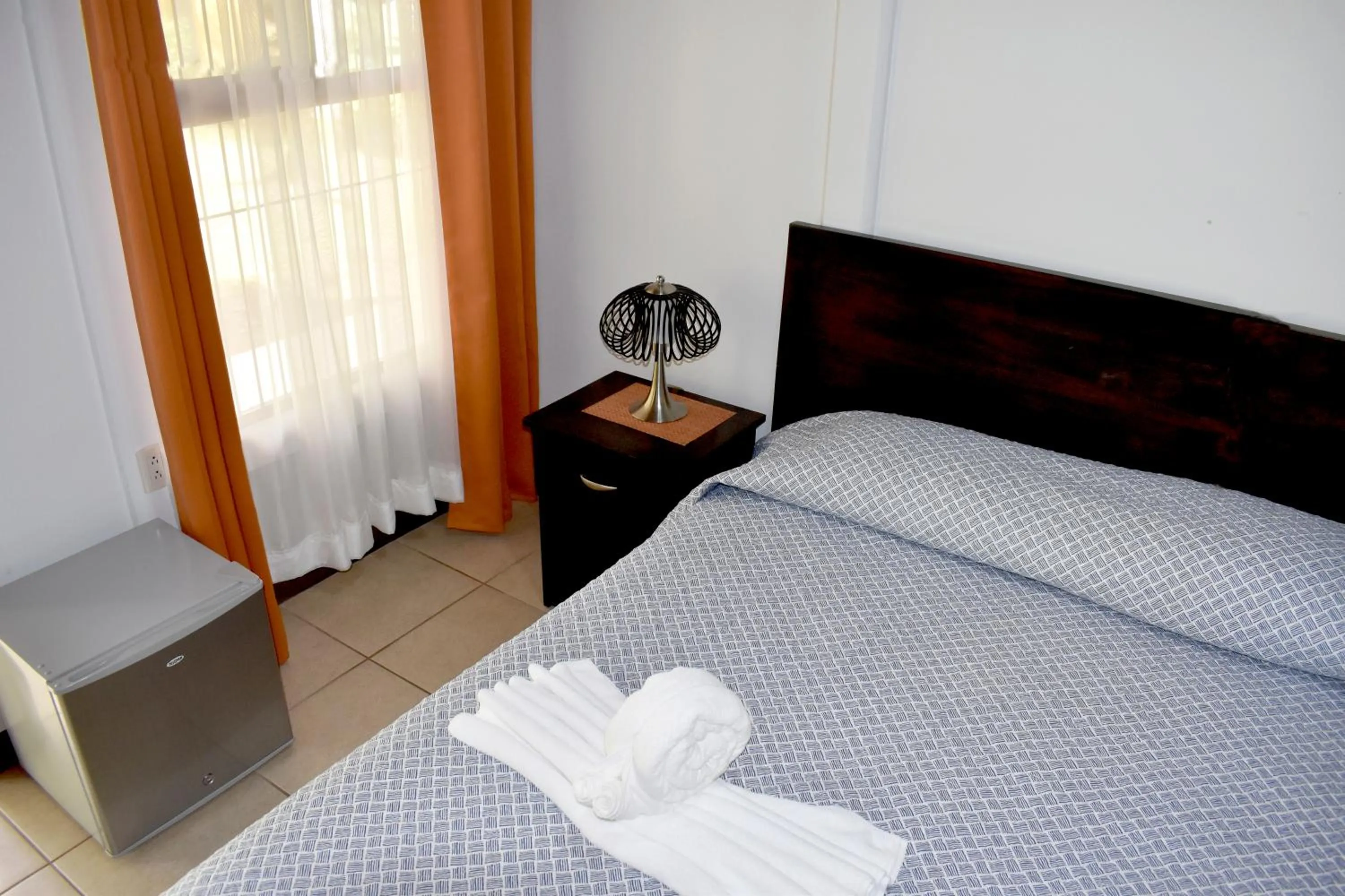 Bed in Hotel Arenal Country Inn