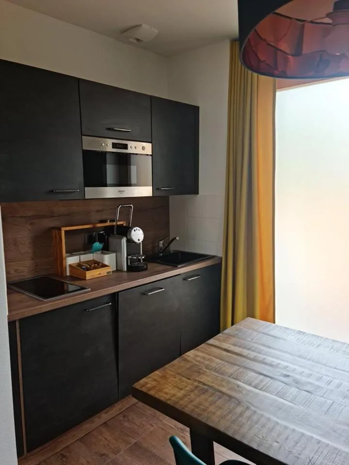 Kitchen or kitchenette in Le Domaine de Rouffach