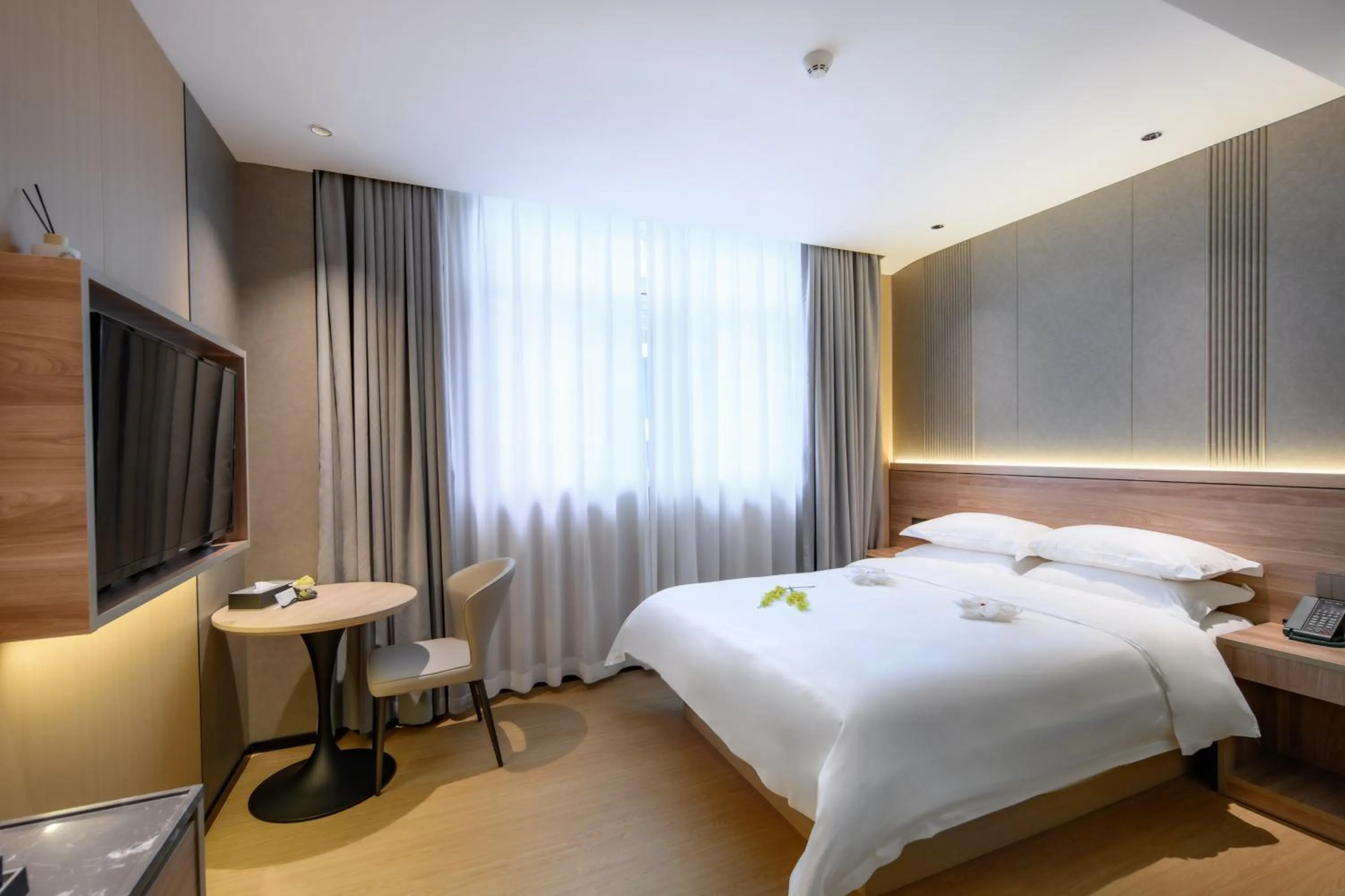 Bed in Shanshui S Hotel