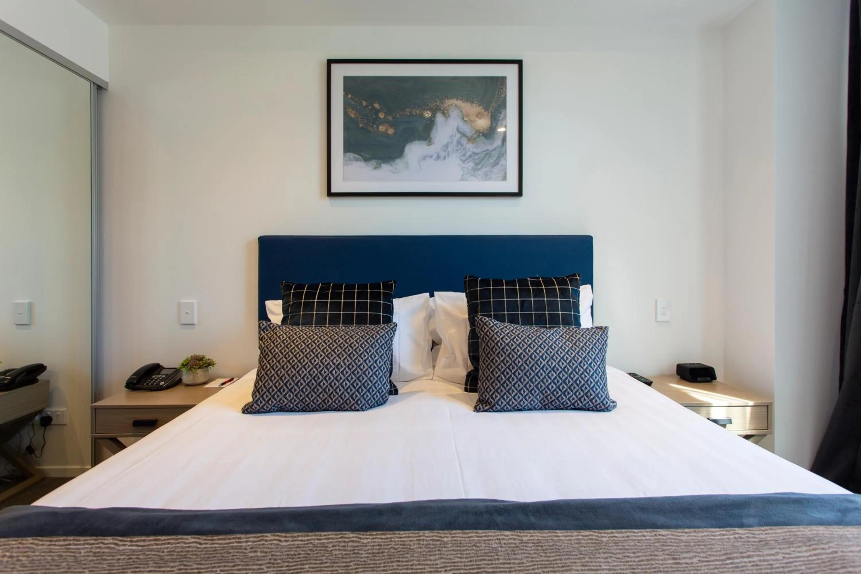 Bed in Ramada by Wyndham Queenstown Central