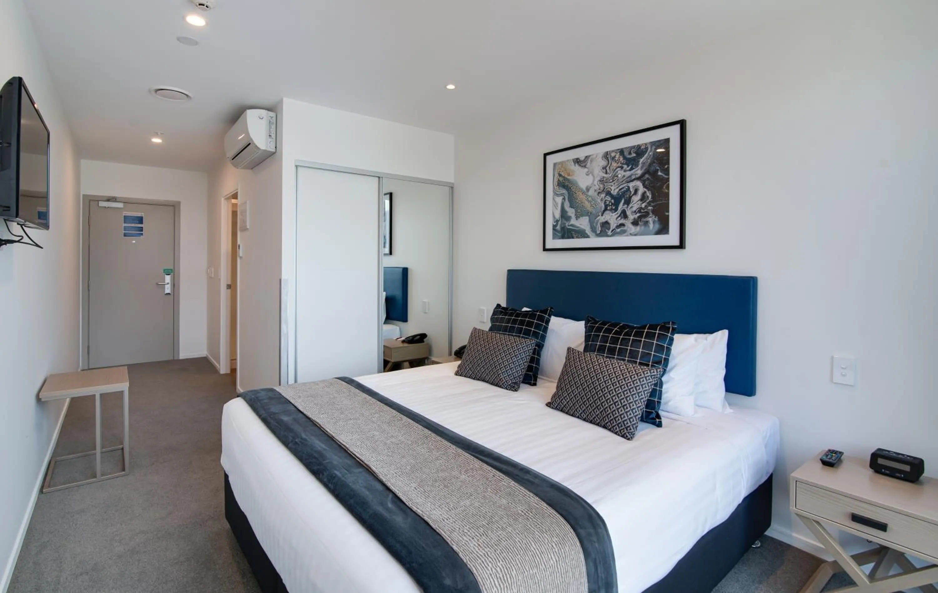 Bed in Ramada by Wyndham Queenstown Central