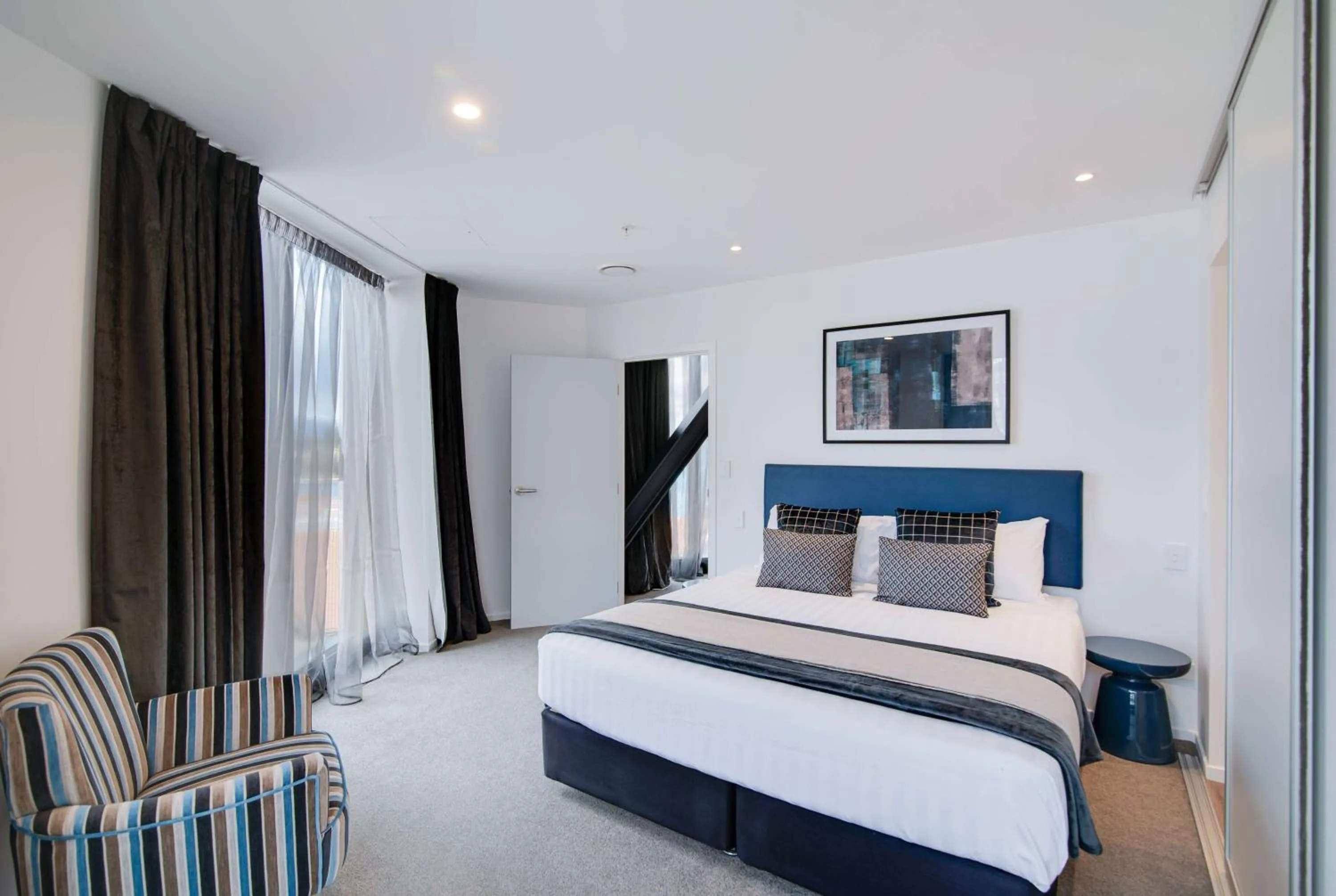 Photo of the whole room, Bed in Ramada by Wyndham Queenstown Central