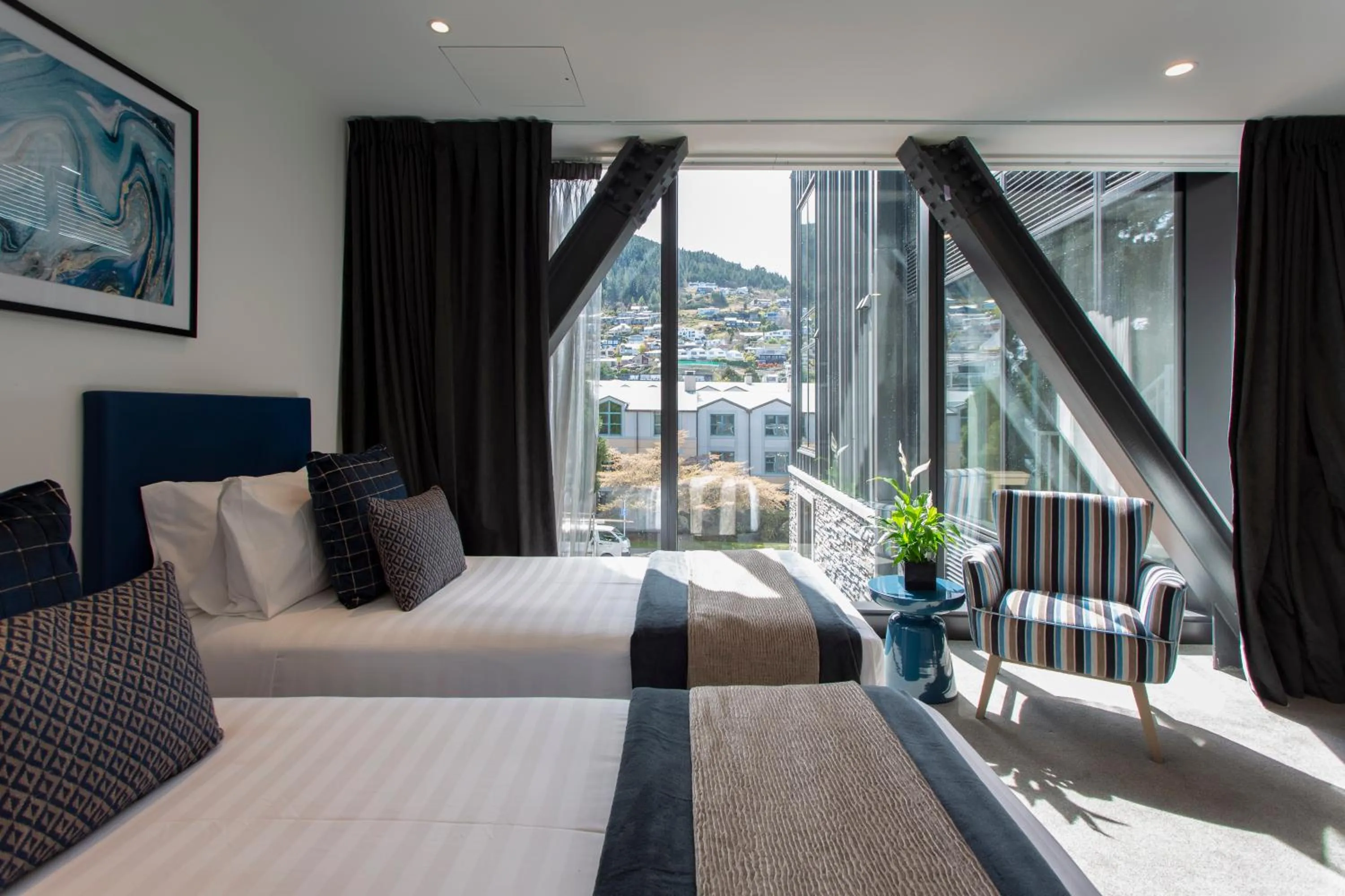 Bed in Ramada by Wyndham Queenstown Central