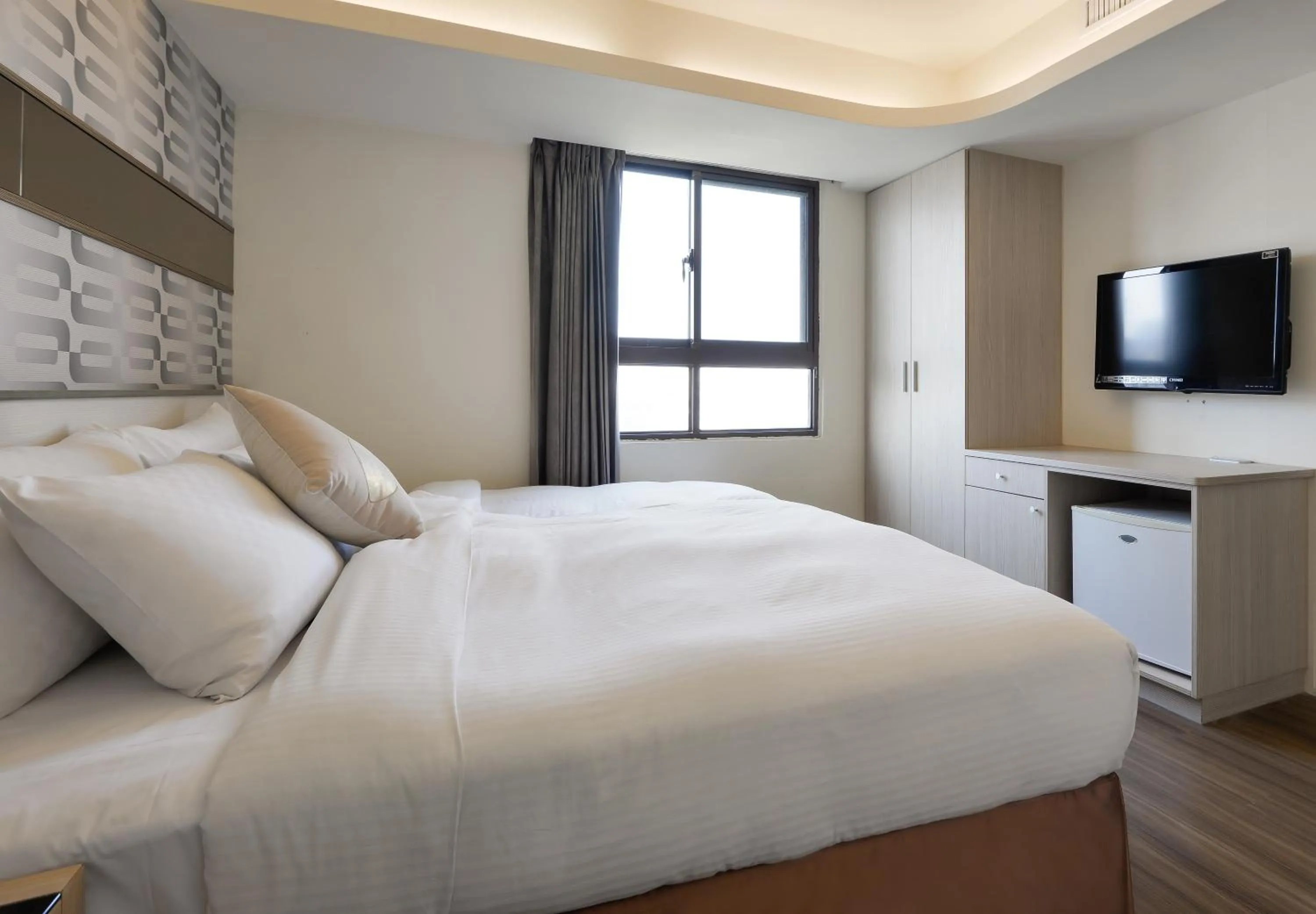 Bed in Taichung One Chung Hotel