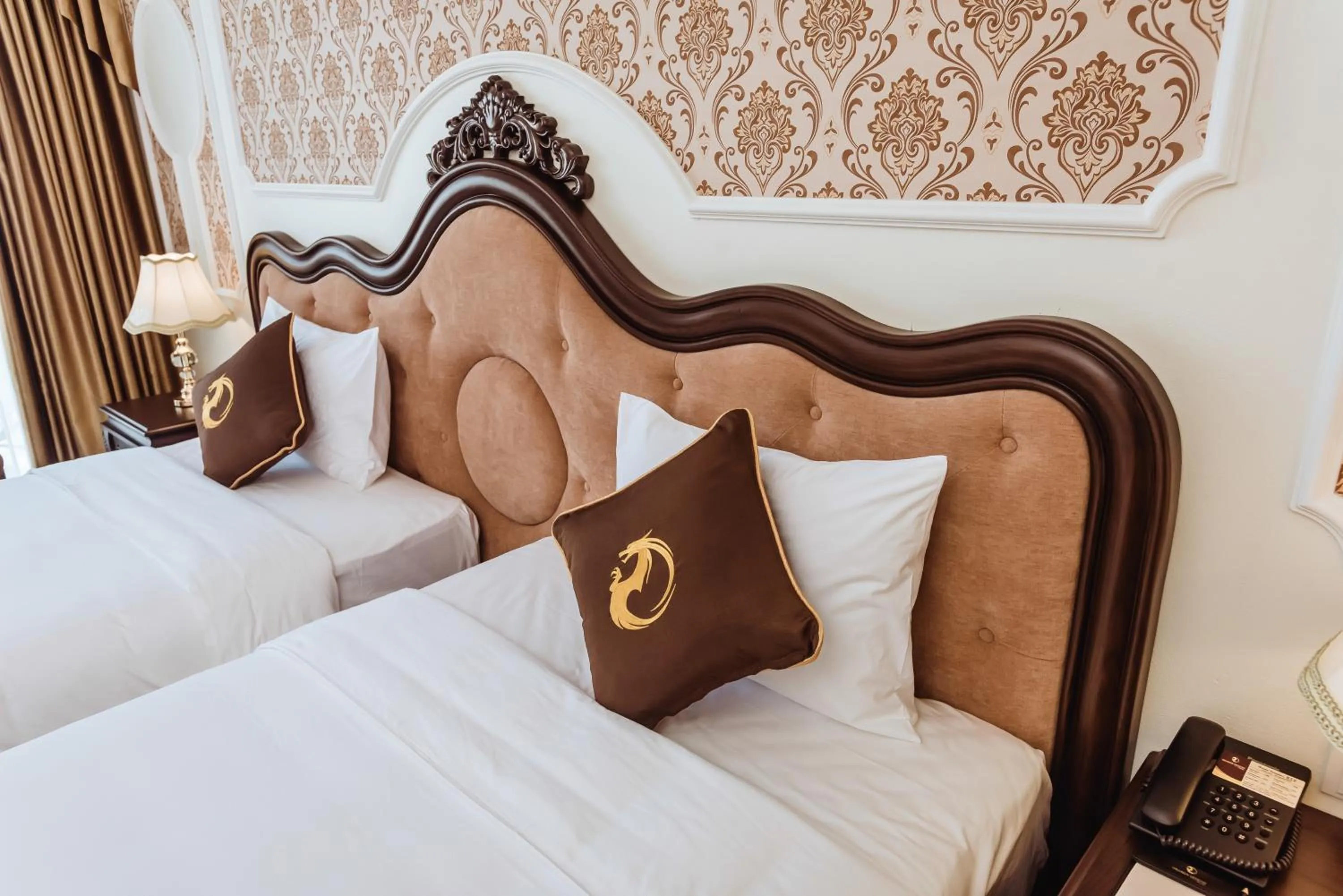 Bed in Dragon Legend Hotel