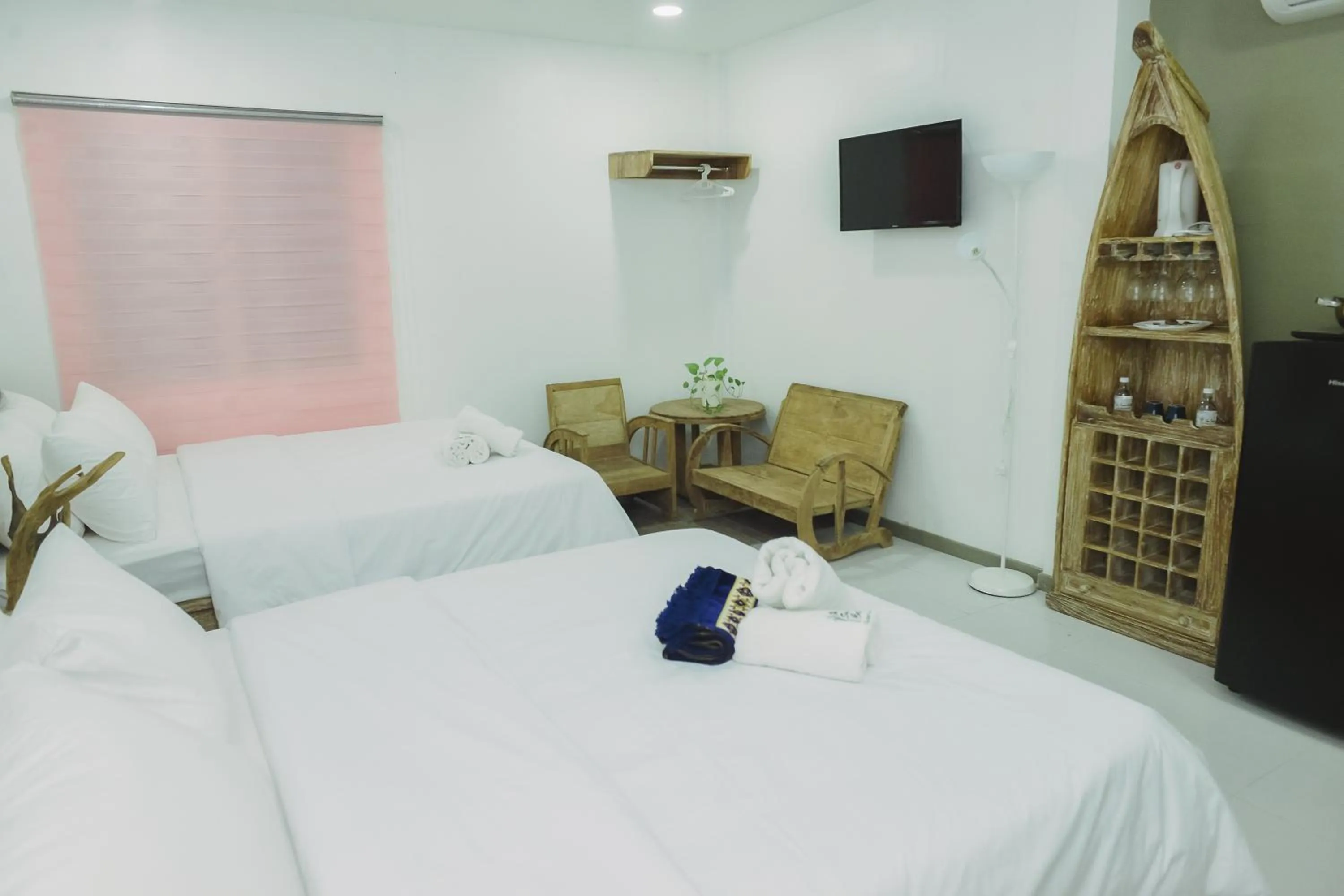 Bed in The Serai Cottage Downtown Hotel