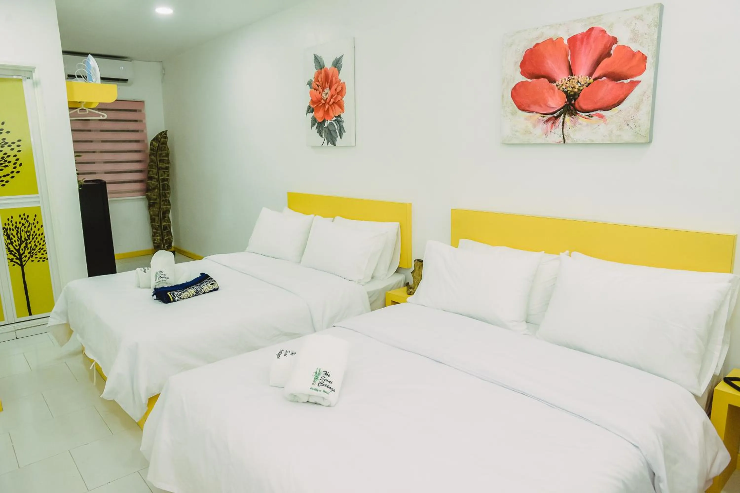 Bed in The Serai Cottage Downtown Hotel