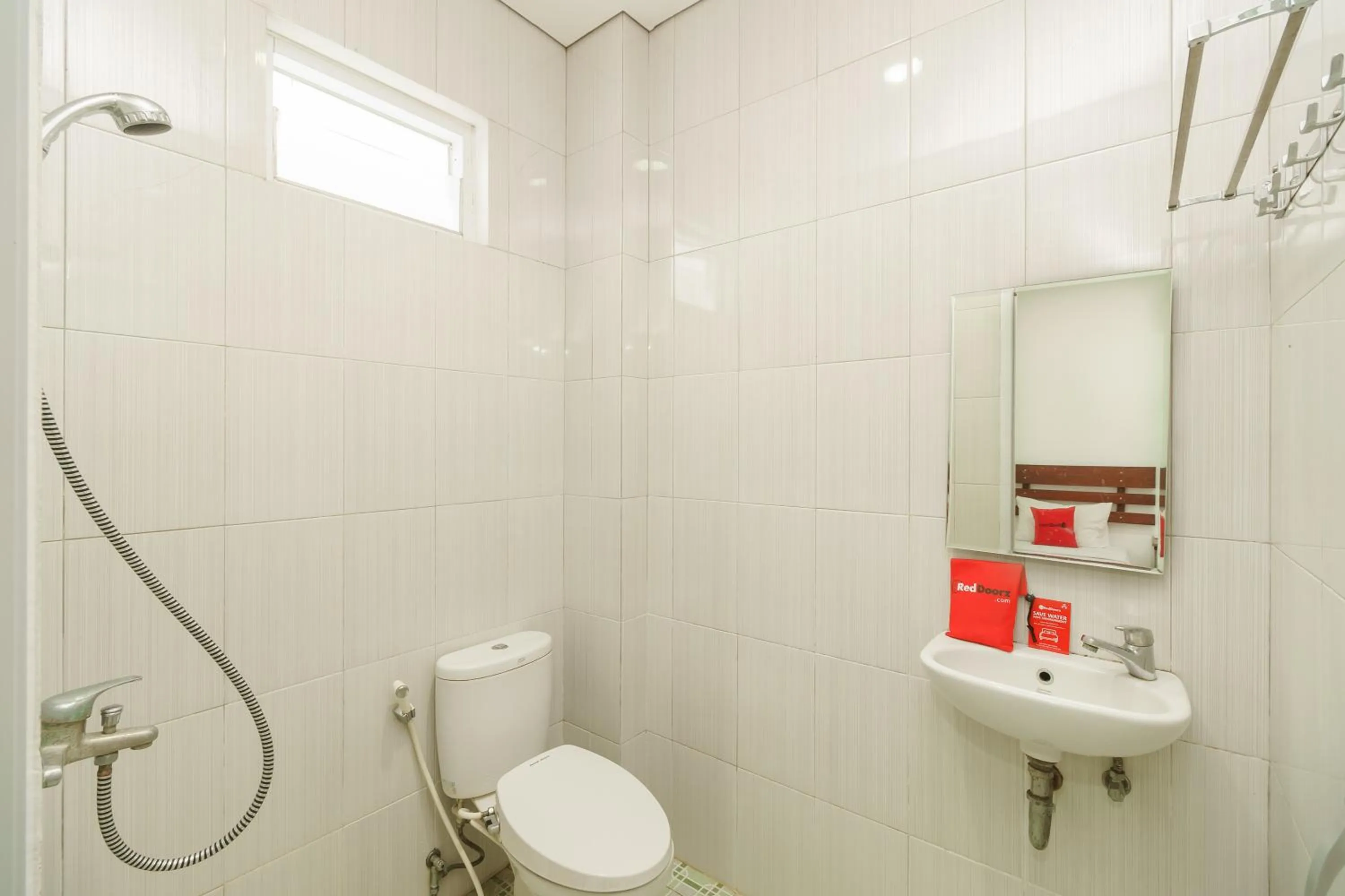 Bathroom in RedDoorz Syariah near Jembatan Siti Nurbaya Padang