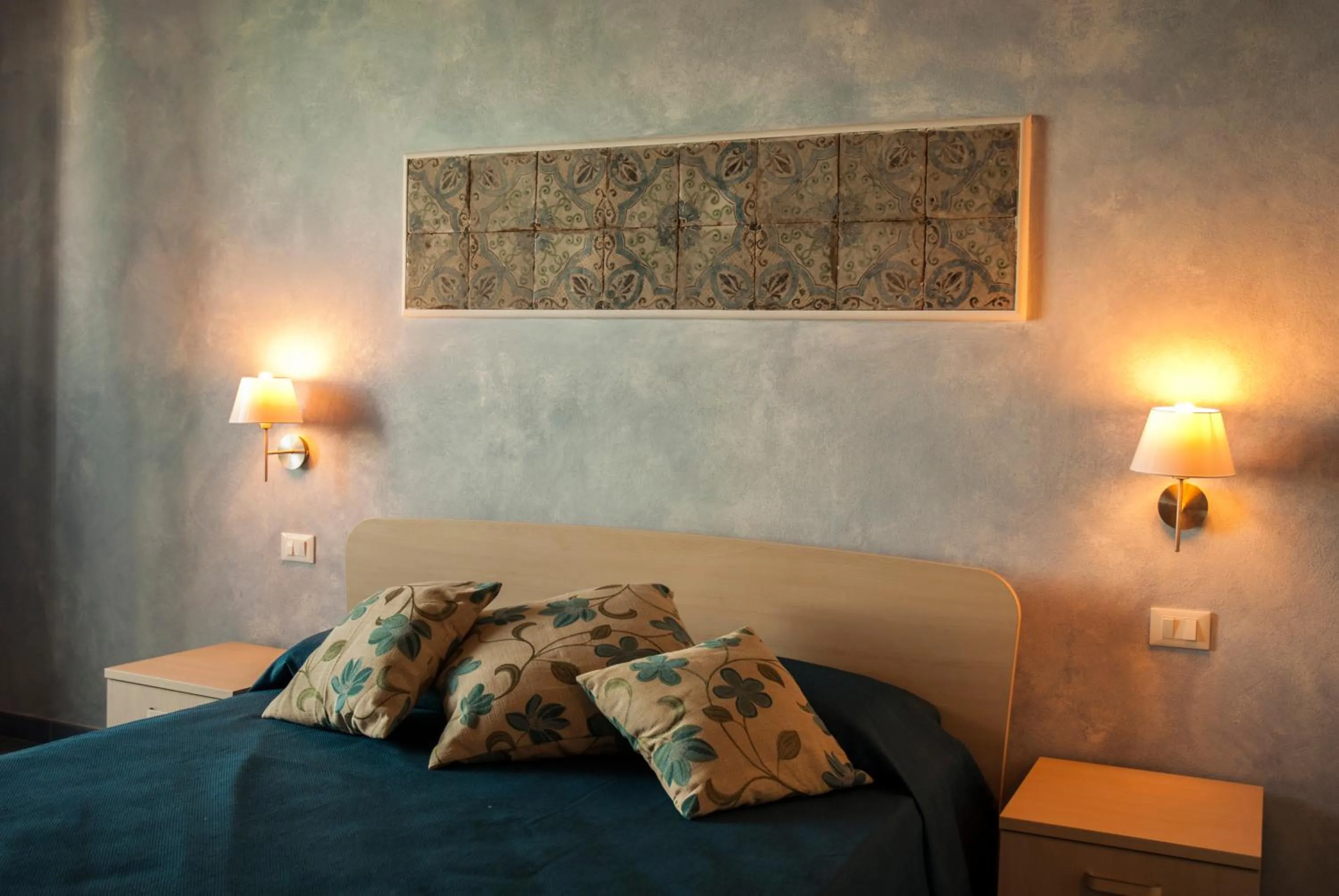 Decorative detail, Bed in Blu Tropea Maison