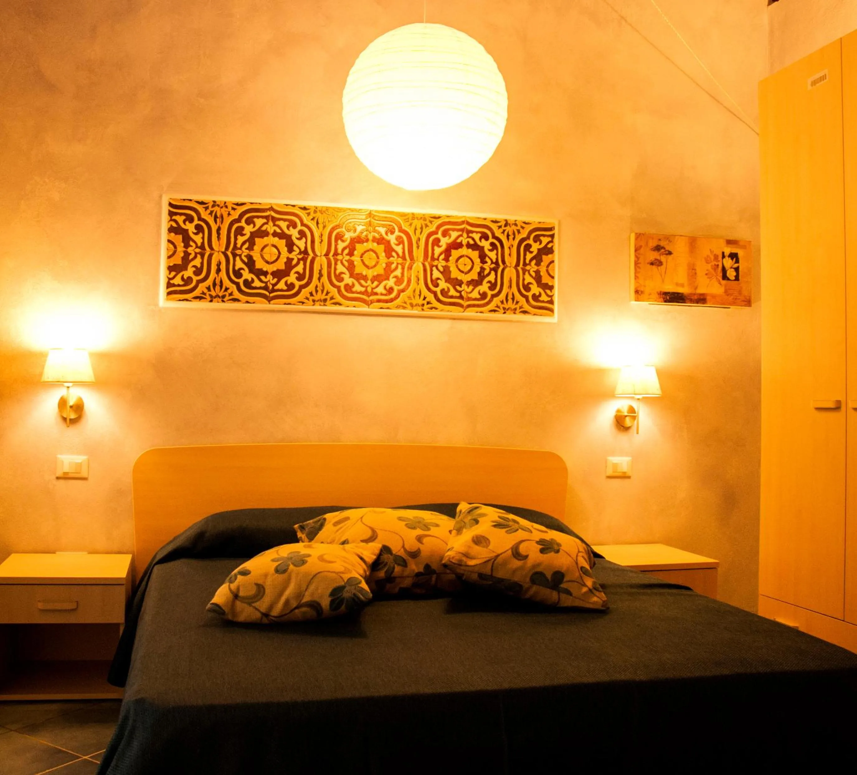 Bed in Blu Tropea Maison