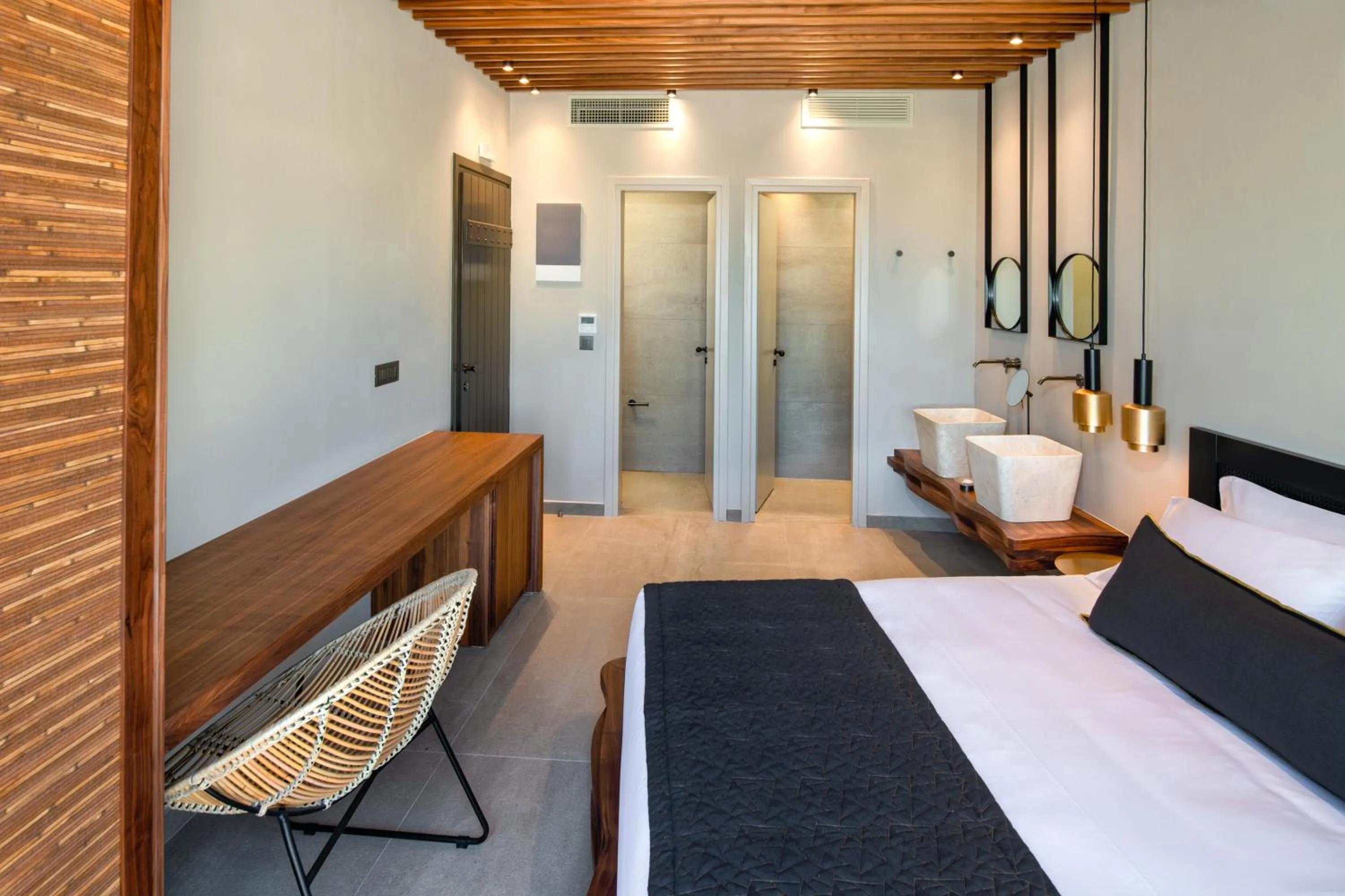 Photo of the whole room, Bed in Uma Ray Suites