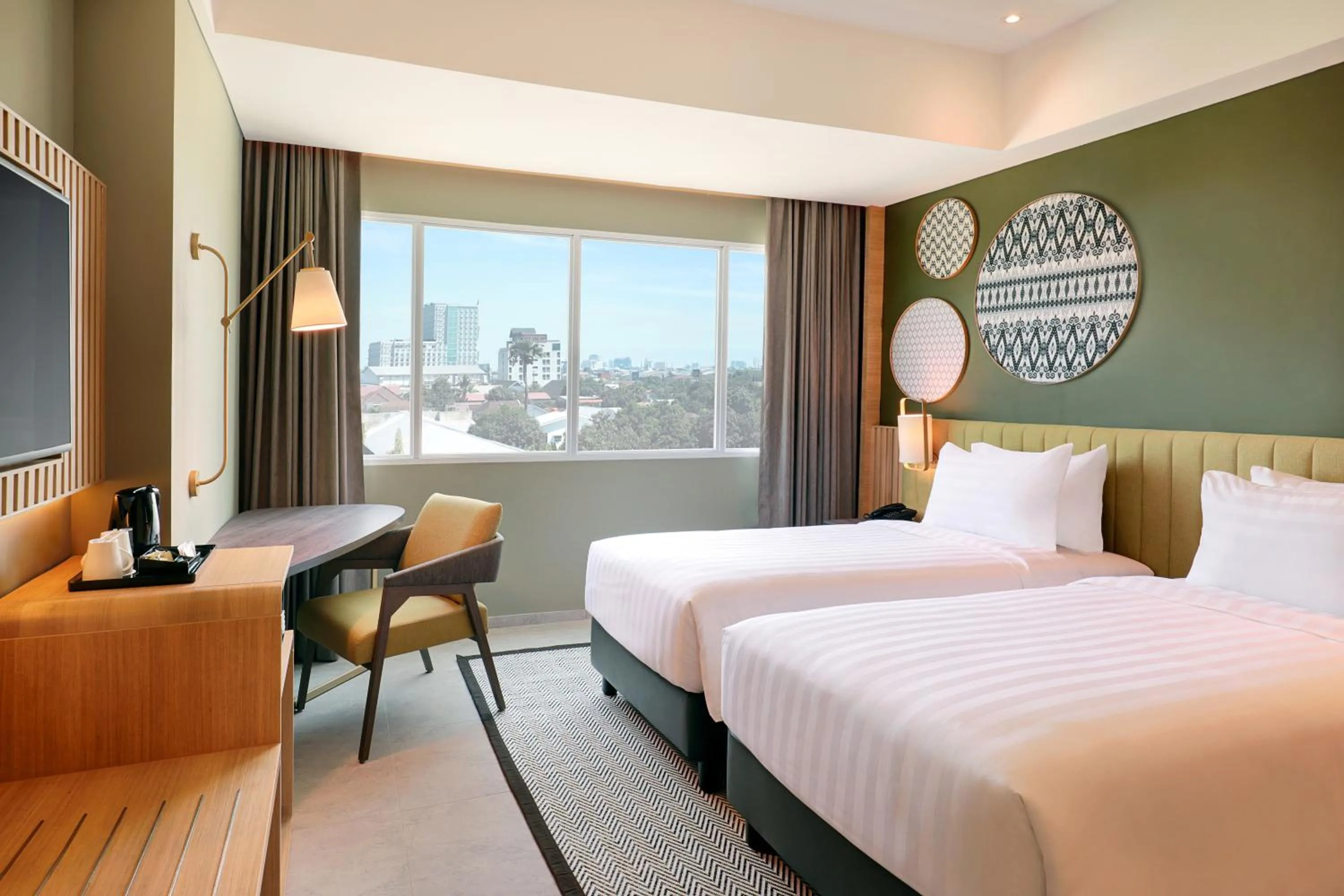 Bed in Mercure Makassar Nexa Pettarani