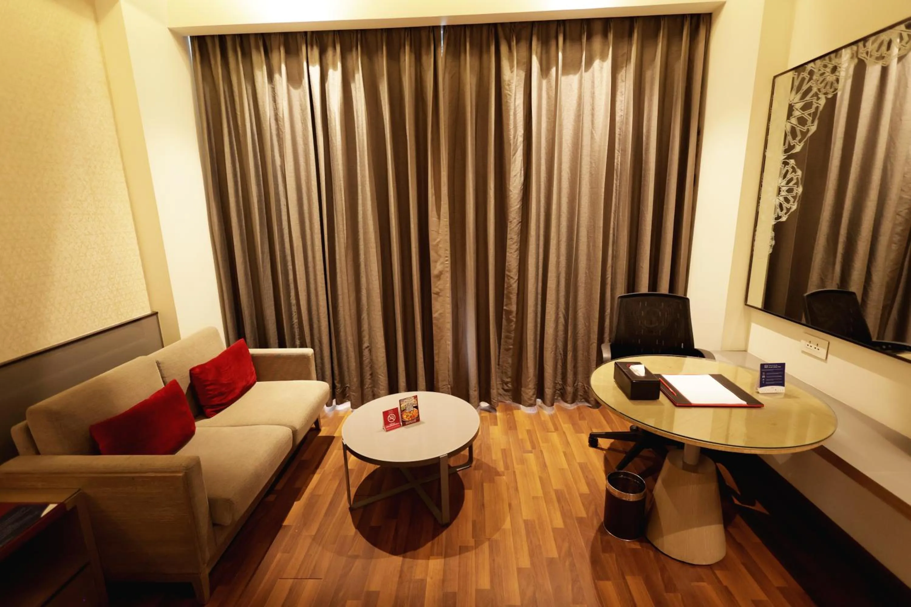 Seating area in Ramada Plaza by Wyndham Lucknow