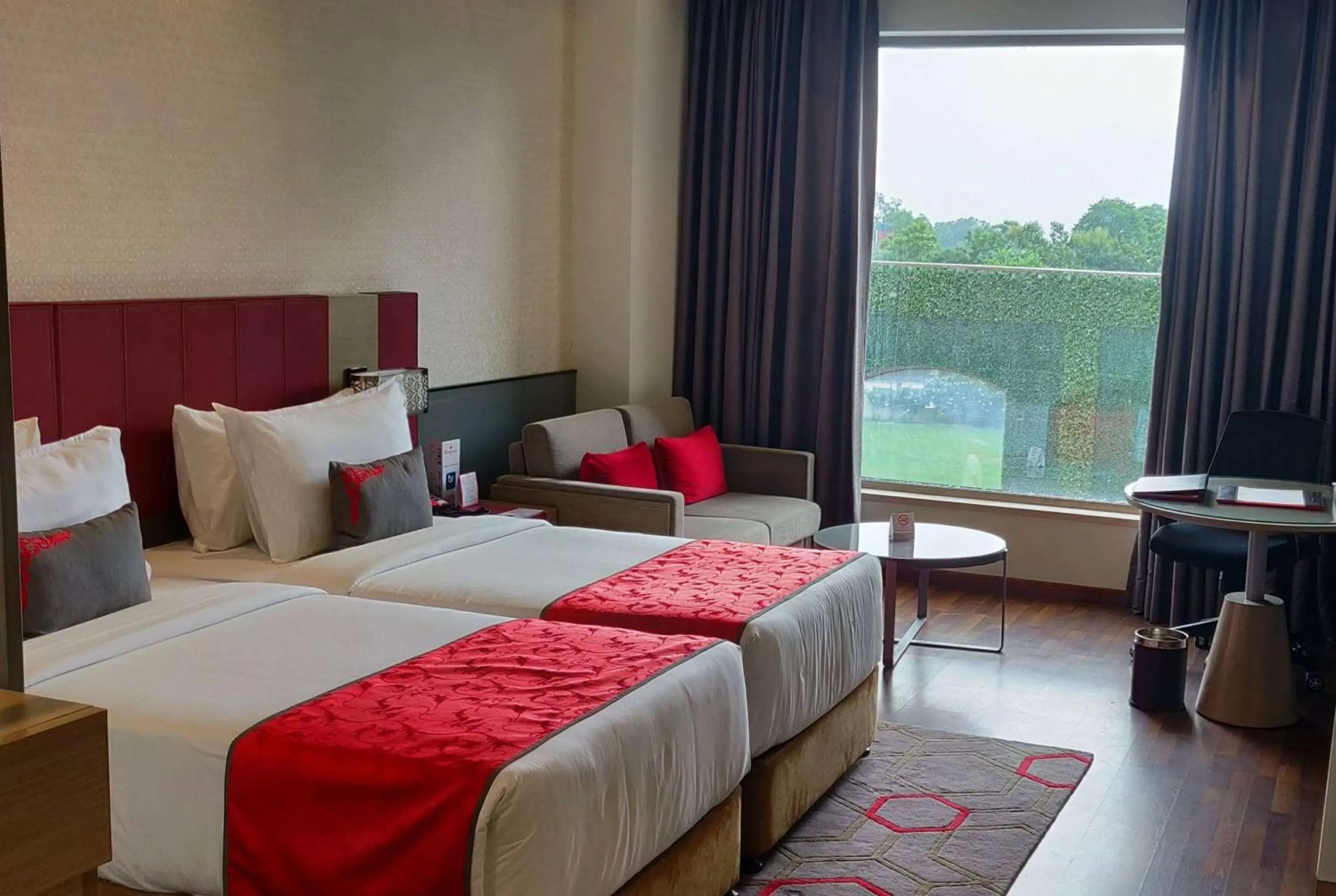 Photo of the whole room, Bed in Ramada Plaza by Wyndham Lucknow