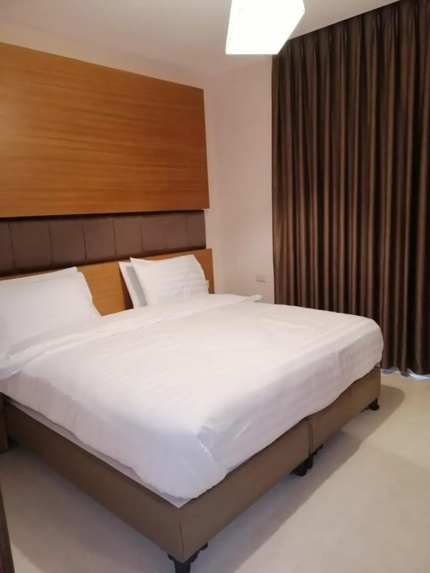 Bedroom in Big Ben Hotel Suites